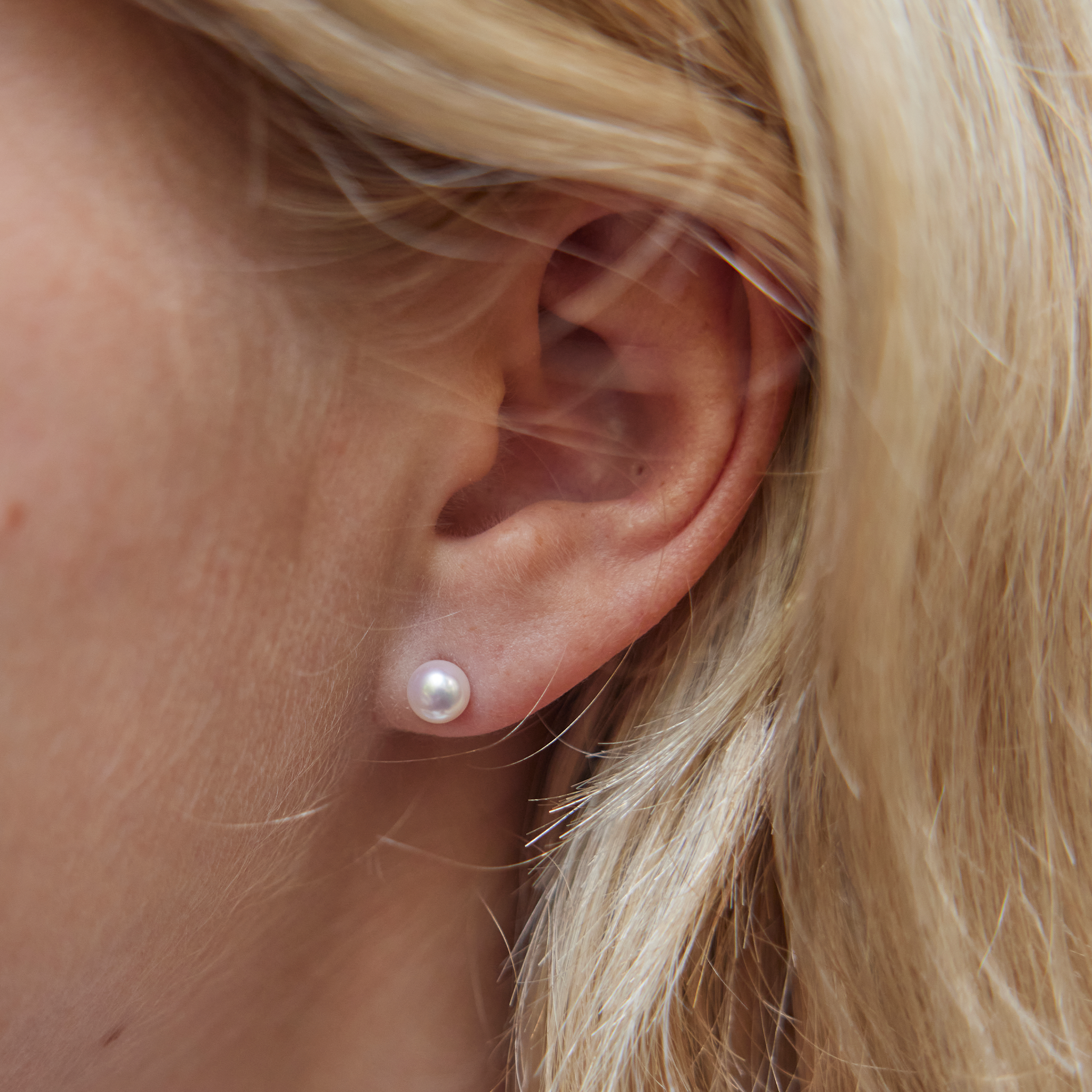 Woman wearing Akoya White Pearl Earrings