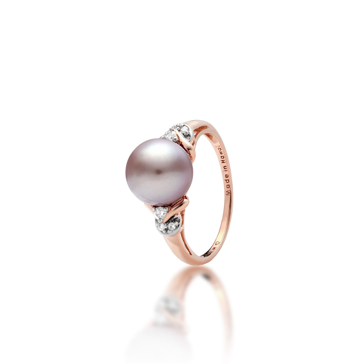 A 14k rose gold ring with a lilac freshwater pearl with diamond accents on each side with darting rose gold curves, shown on a white background