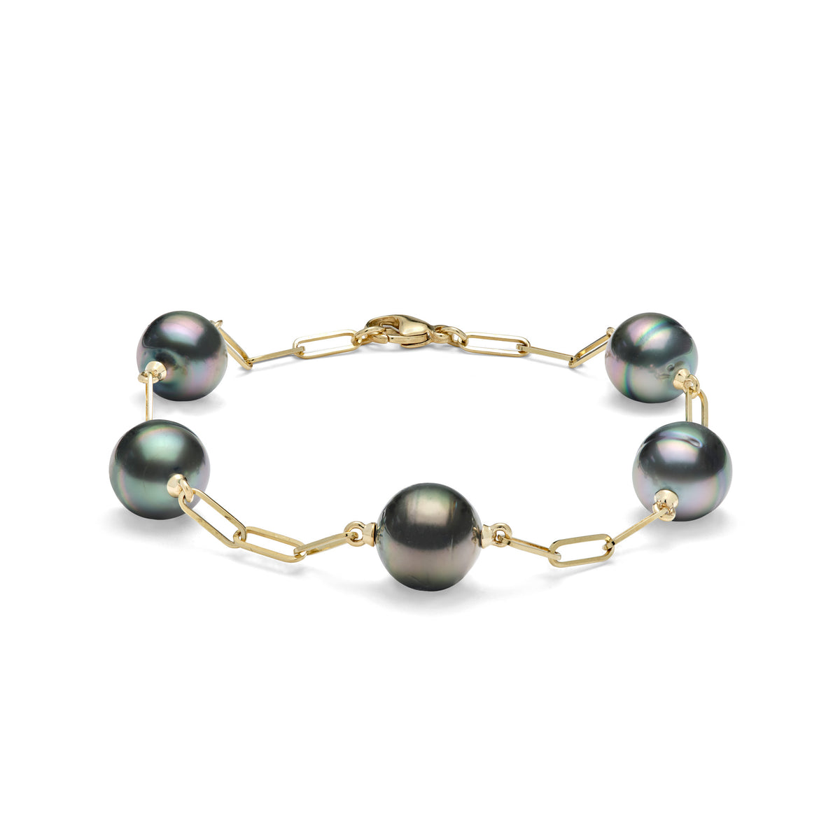 A 14k yellow gold paperclip chain bracelet with five circle Tahitian black pearls, shown on a white background