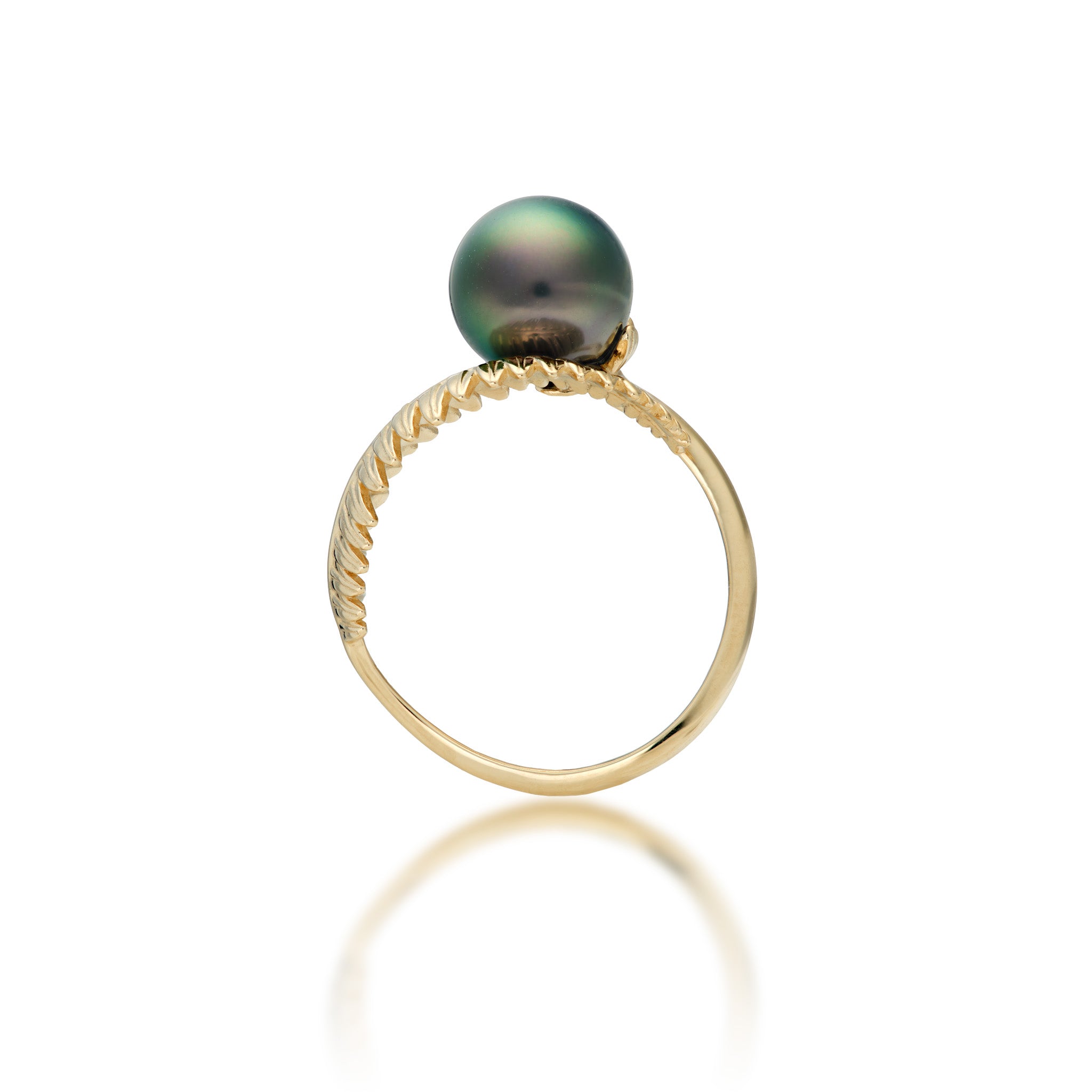 Side view of the Kupukupu Fern Tahitian Black Pearl Bypass Ring in 14k Yellow Gold on a white background