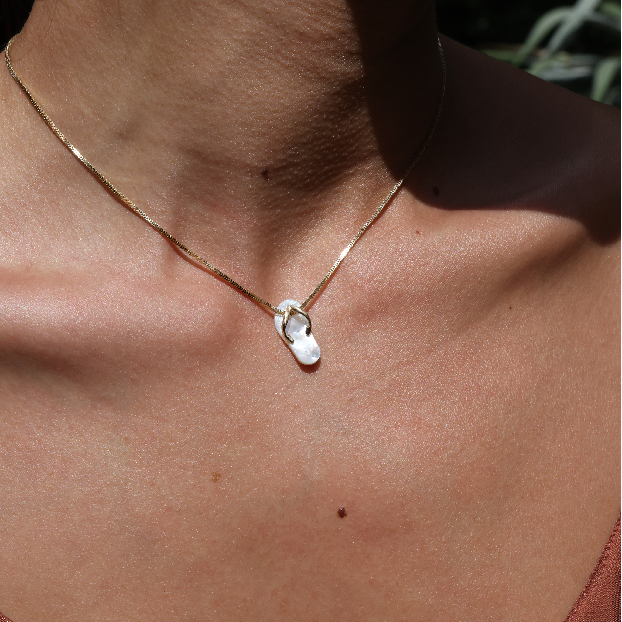 White Mother of Pearl Slipper Pendant in Gold - 20mm