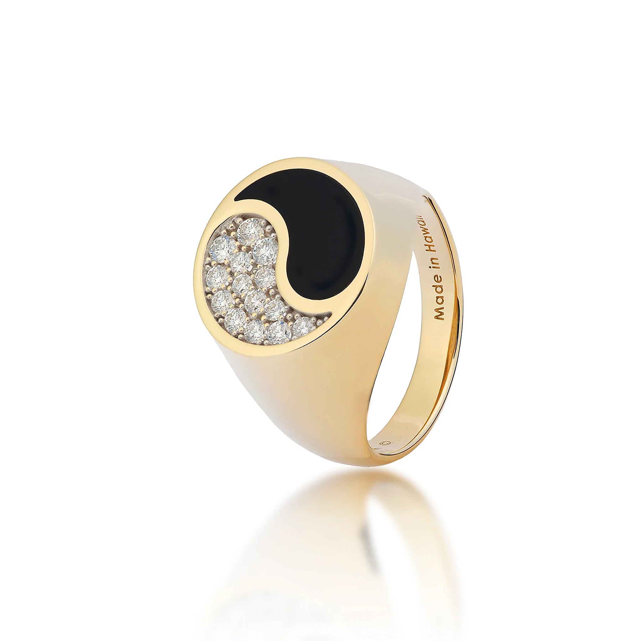 Tapered 17.5mm Yin Yang Collection Ring in high-polish 14k yellow gold with Hawaiian black coral inlay and natural diamonds that create the yin yang design and a ʻMade in Hawaiiʻ inscription inside the band on a white background
