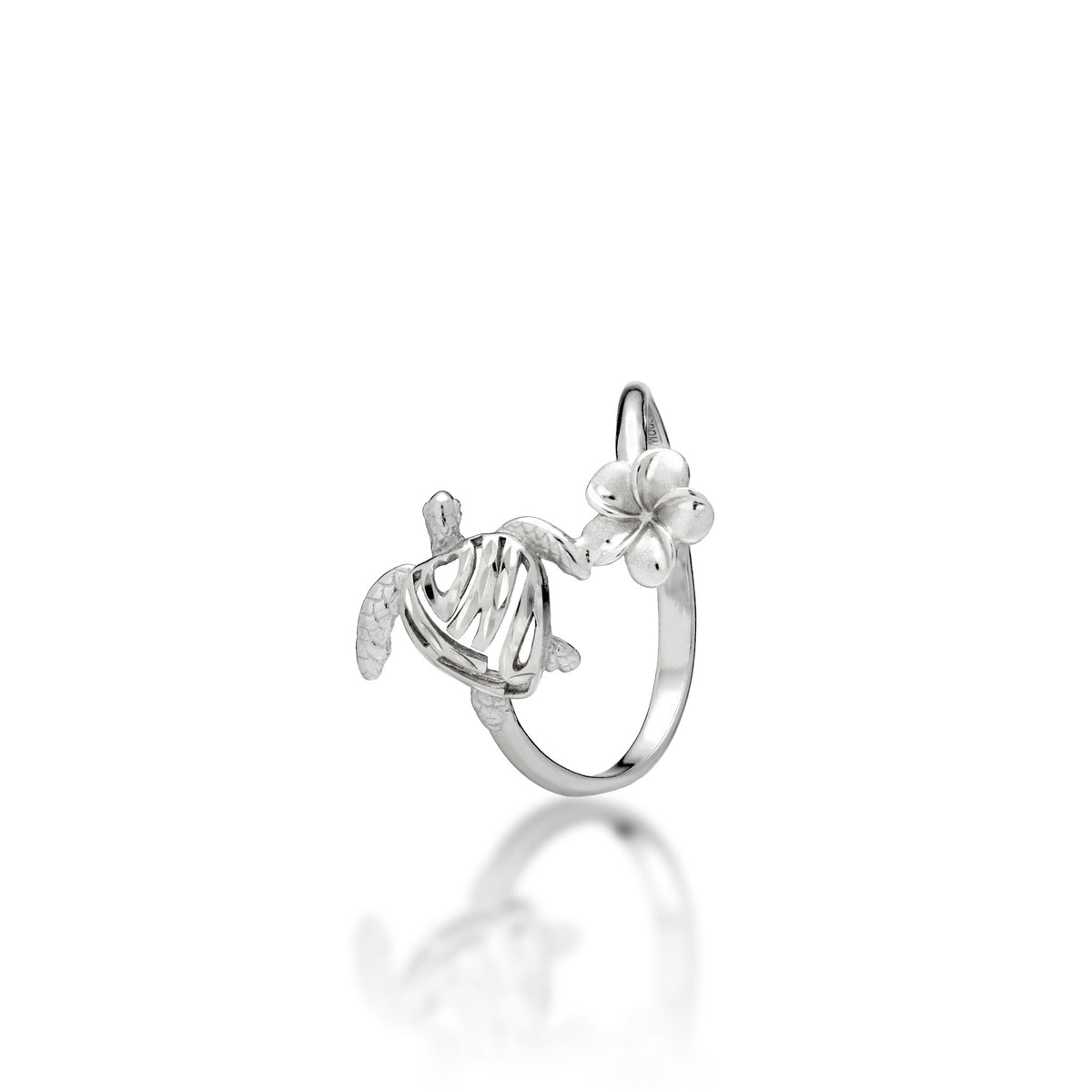 A sterling silver ring featuring a stylized sea turtle with a heart-shaped shell that has "HONU" cut out in it, a small plumeria flower connecting the turtle to the other side of the band, shown on a clean white background with a soft reflection.
