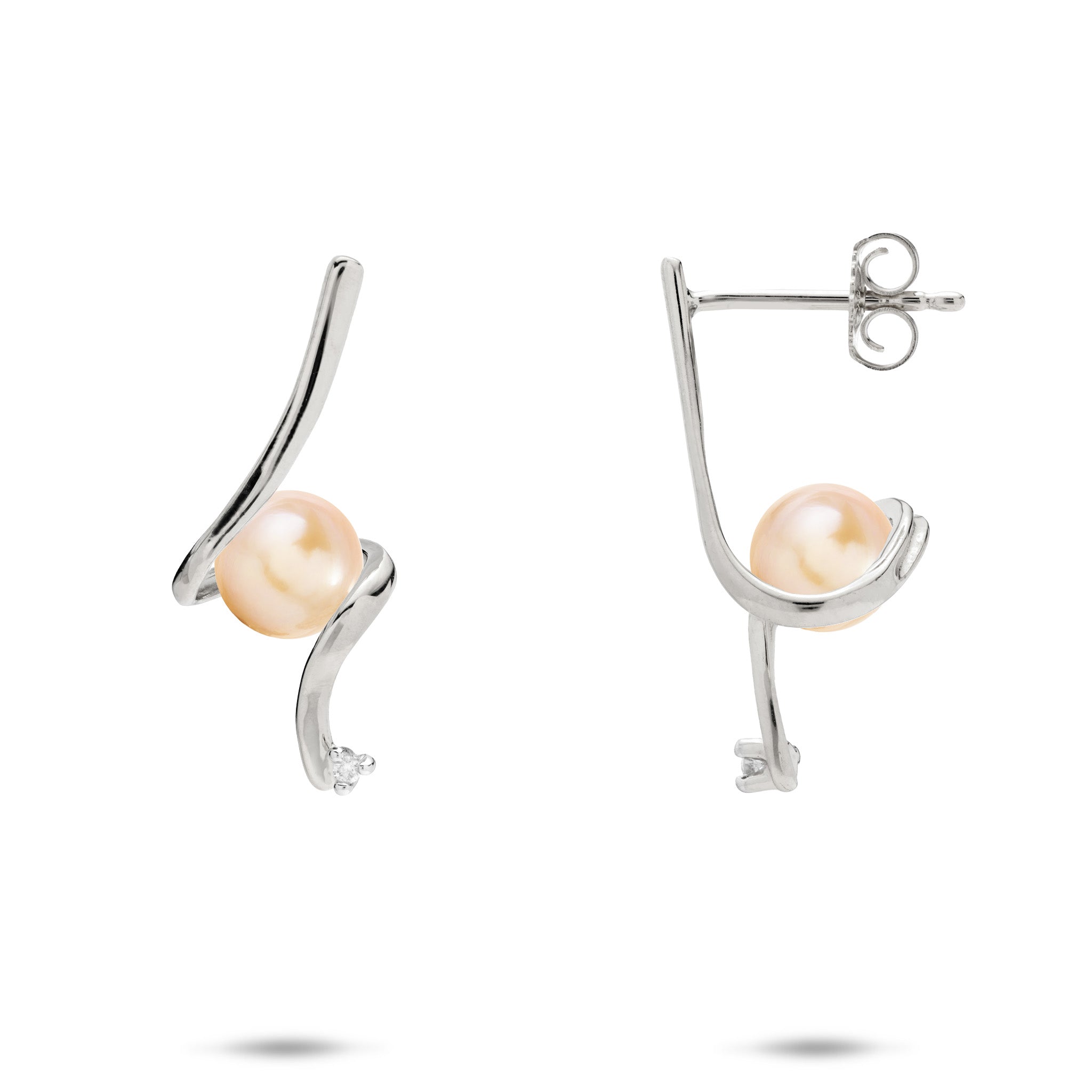 A pair of 14k white gold waterfall spiral style stud earrings wrapping a peach freshwater pearl and a diamond at the bottom, shown on a white background