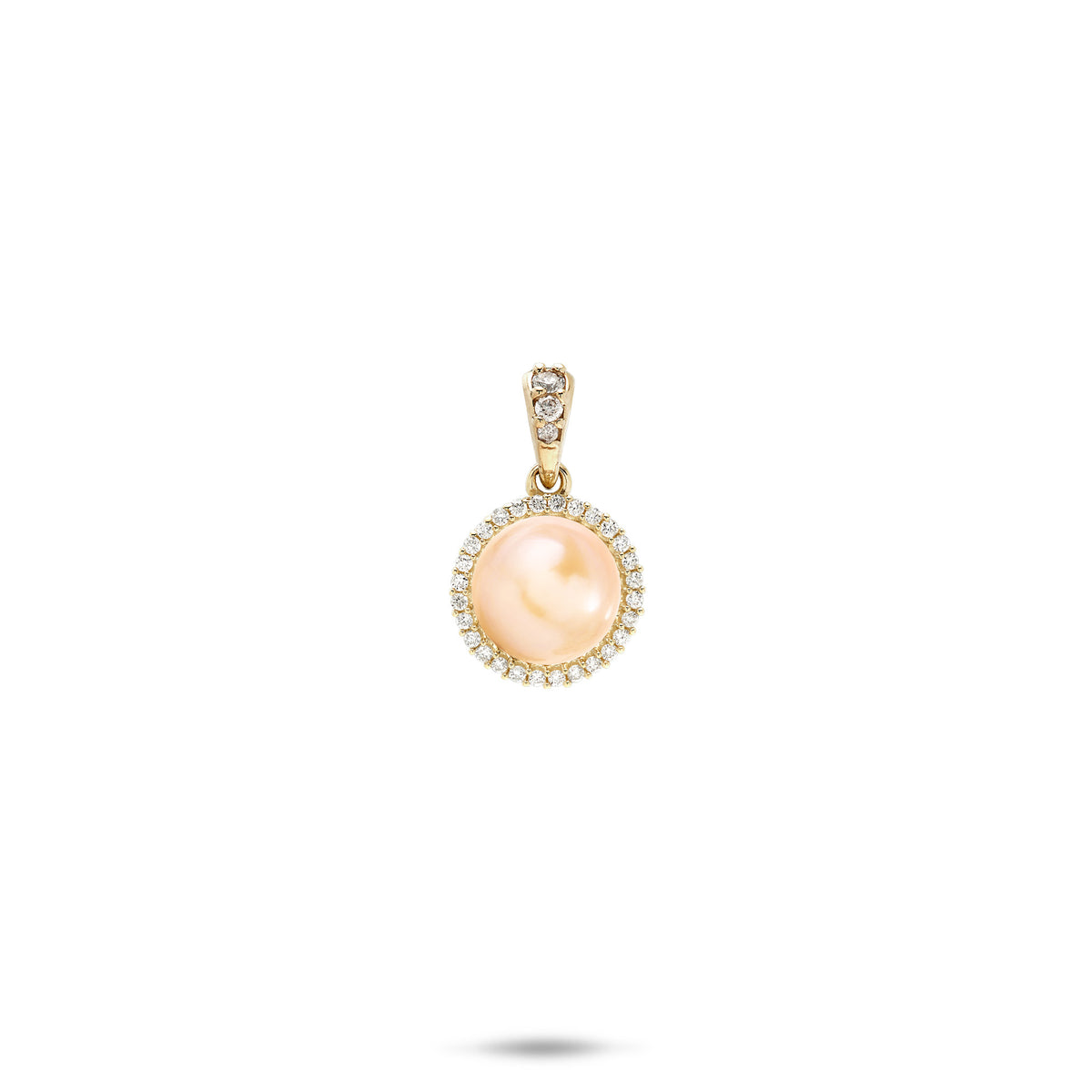 A 14k yellow gold diamond halo pendant with a peach freshwater pearl and diamond high-polish bail, shown on a white background