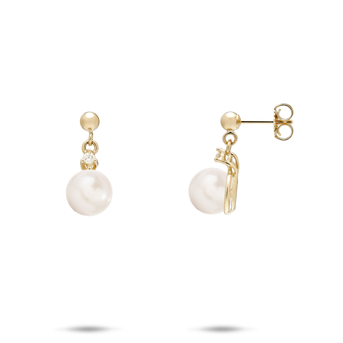 A pair of 14k yellow gold ball-post earrings with a dangling small diamond and white freshwater pearl, shown on a white background