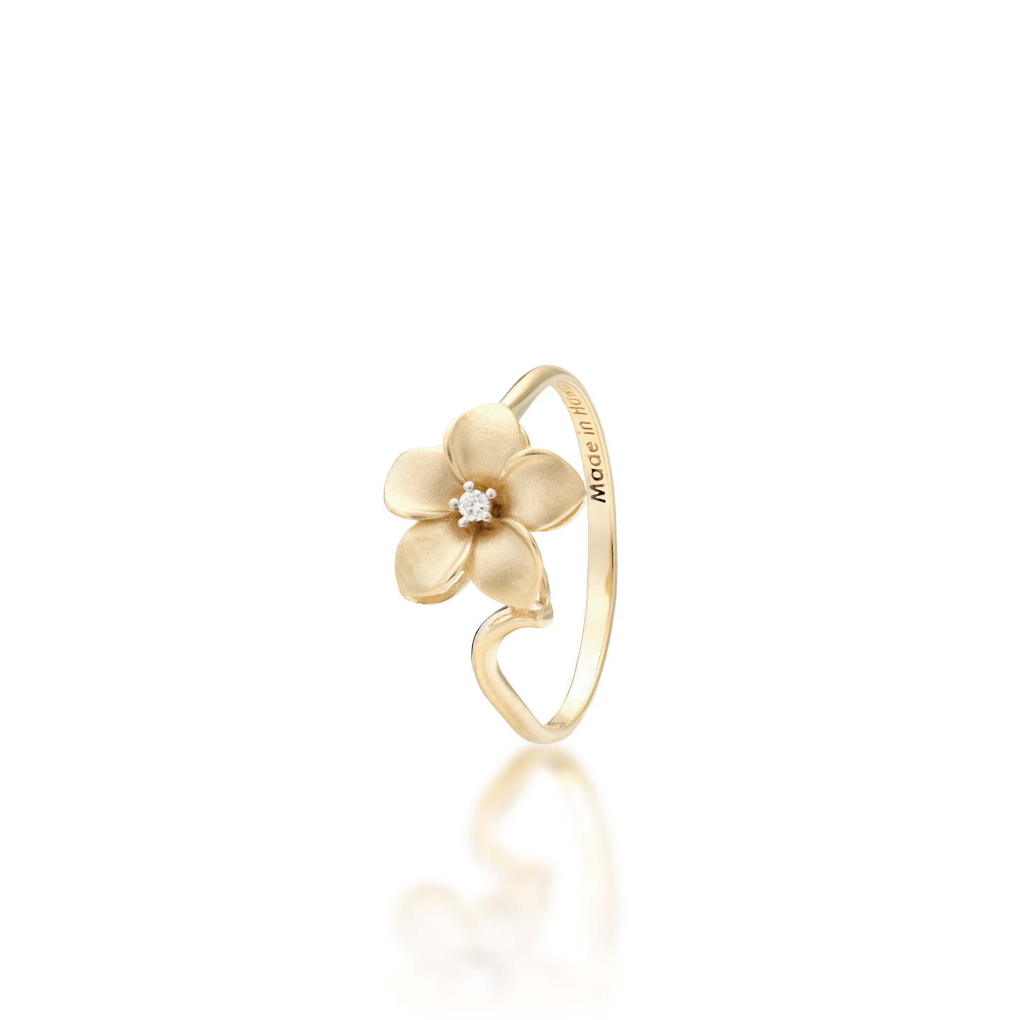Angle view of the 11mm Plumeria Ring in Gold with Diamond on a white background