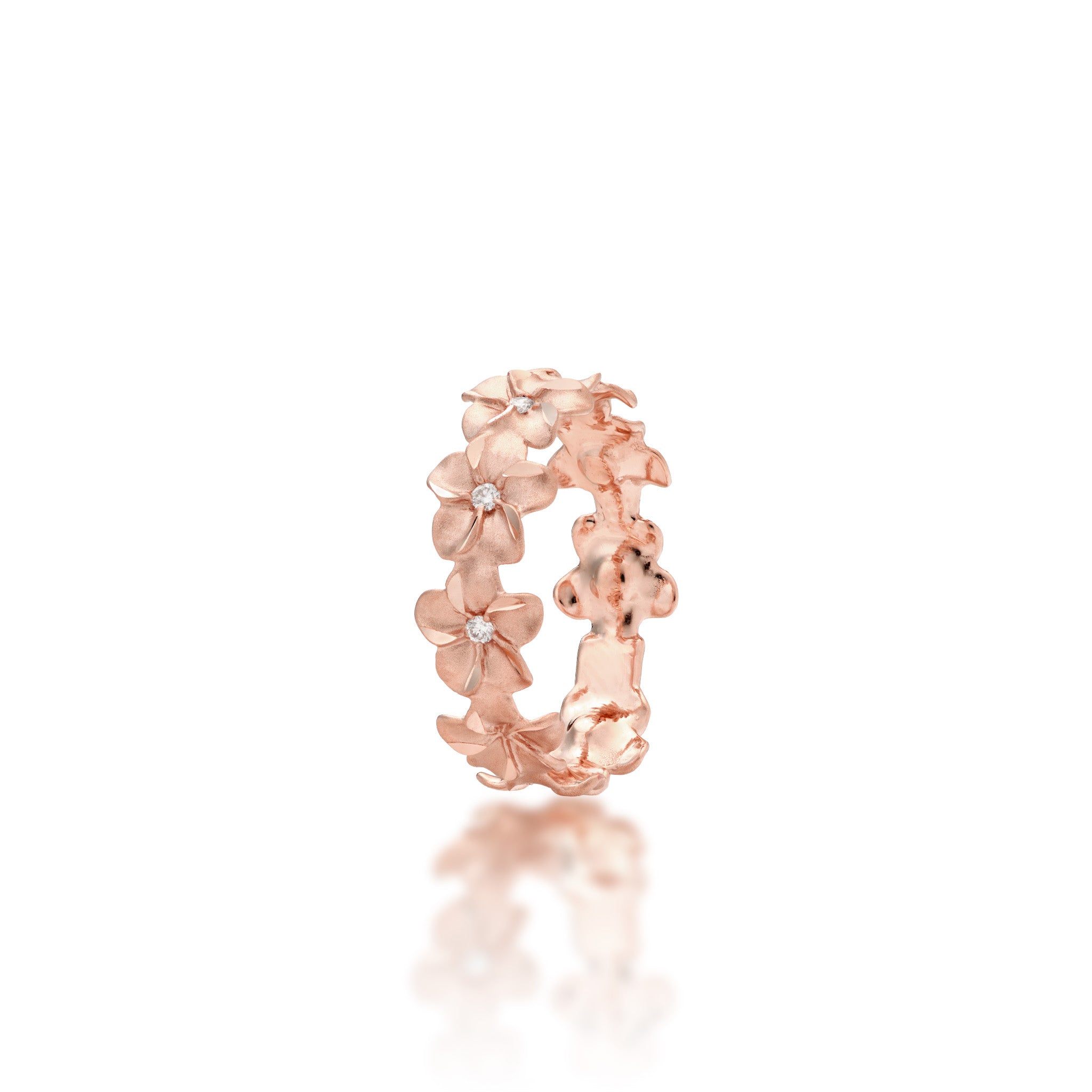 Angle view of the 6mm Plumeria Eternity Ring in 14k Rose Gold with Diamonds