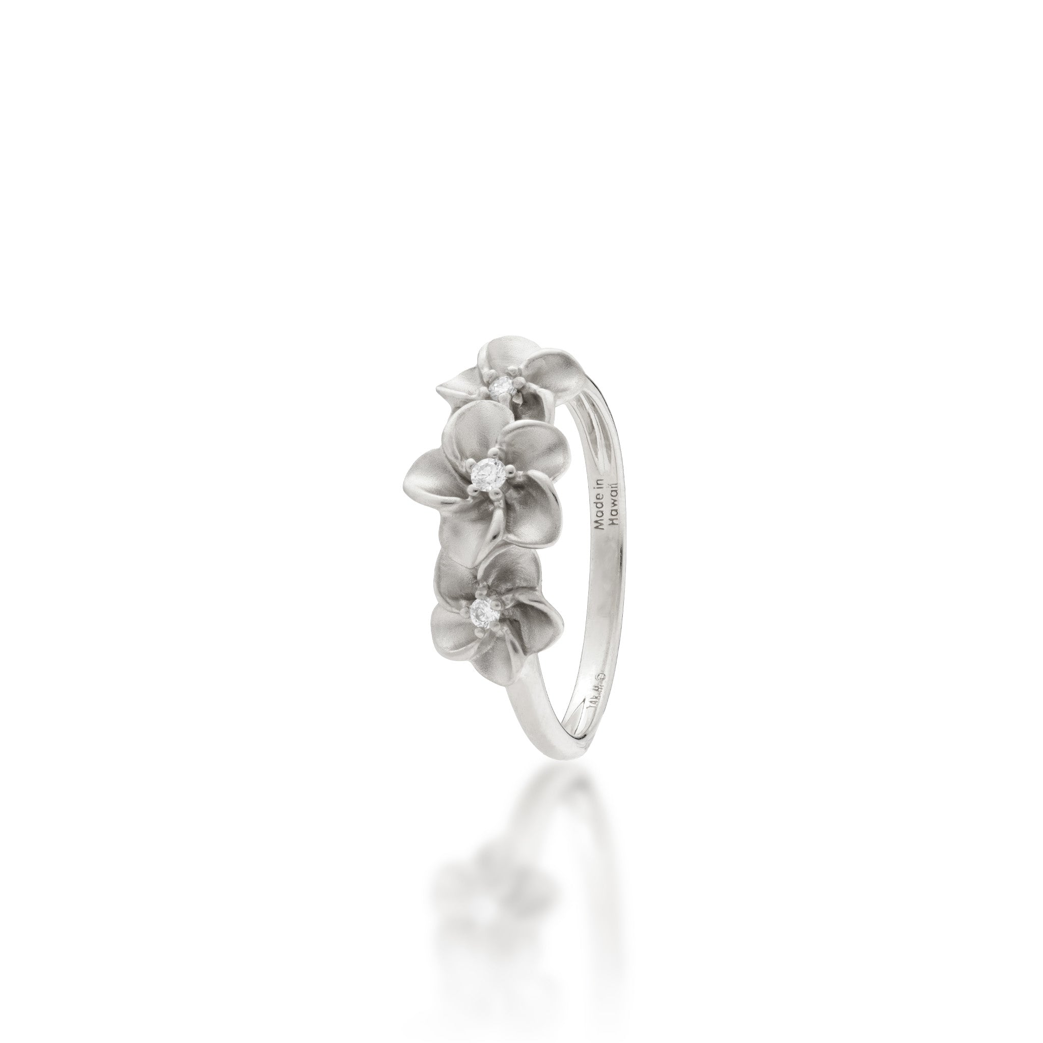 Angle view of the 8mm Plumeria Ring in White Gold with Diamonds on a white background