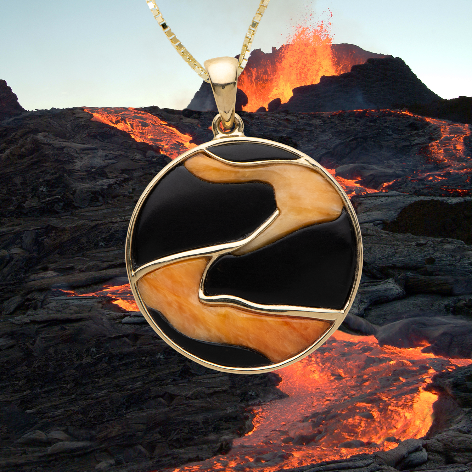 Lava Flow Hawaiian black coral and spiny oyster pendant in yellow gold on a box chain with a volcano erupting in the background