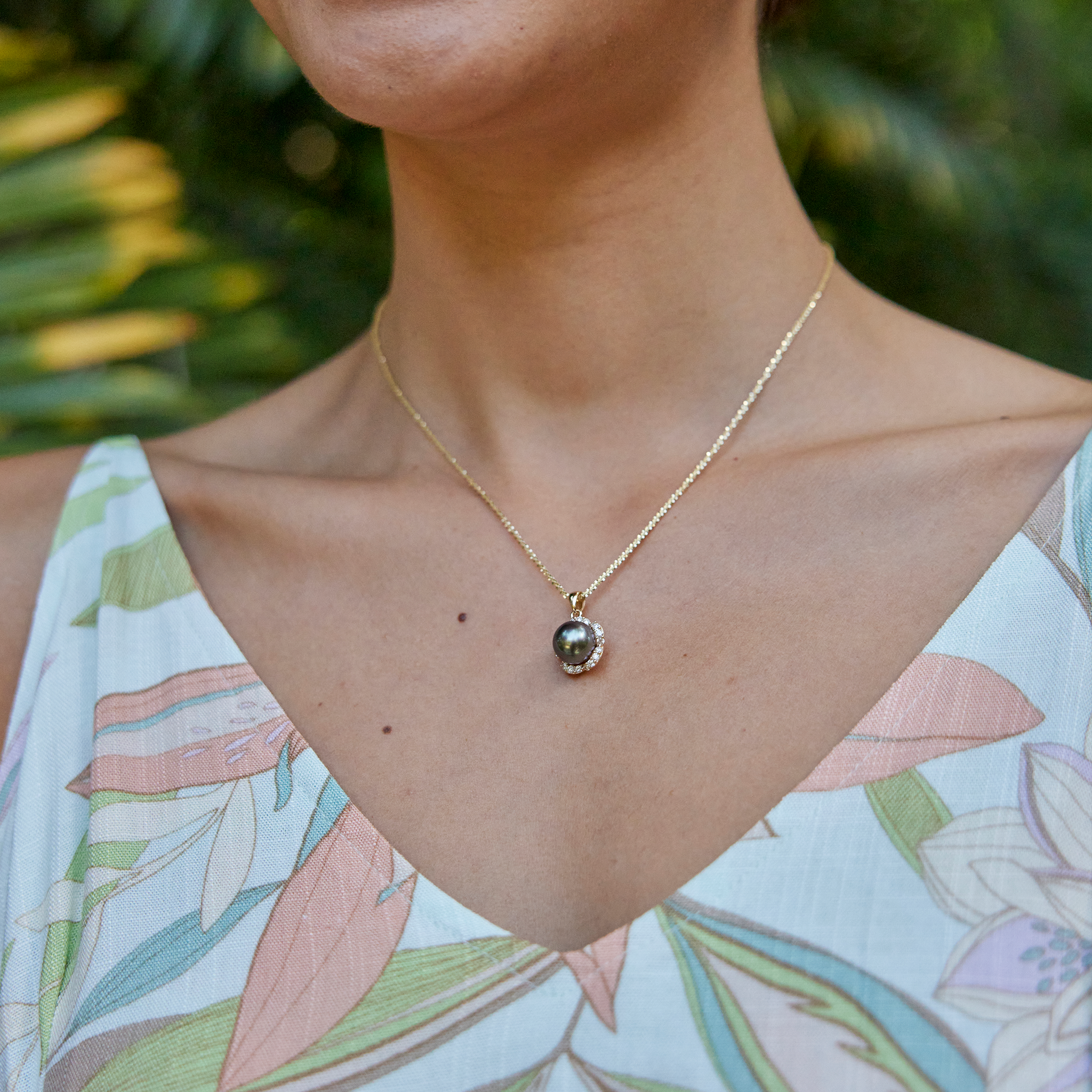 Model Wearing Plumeria Tahitian Black Pearl Pendant in Gold with Diamonds 