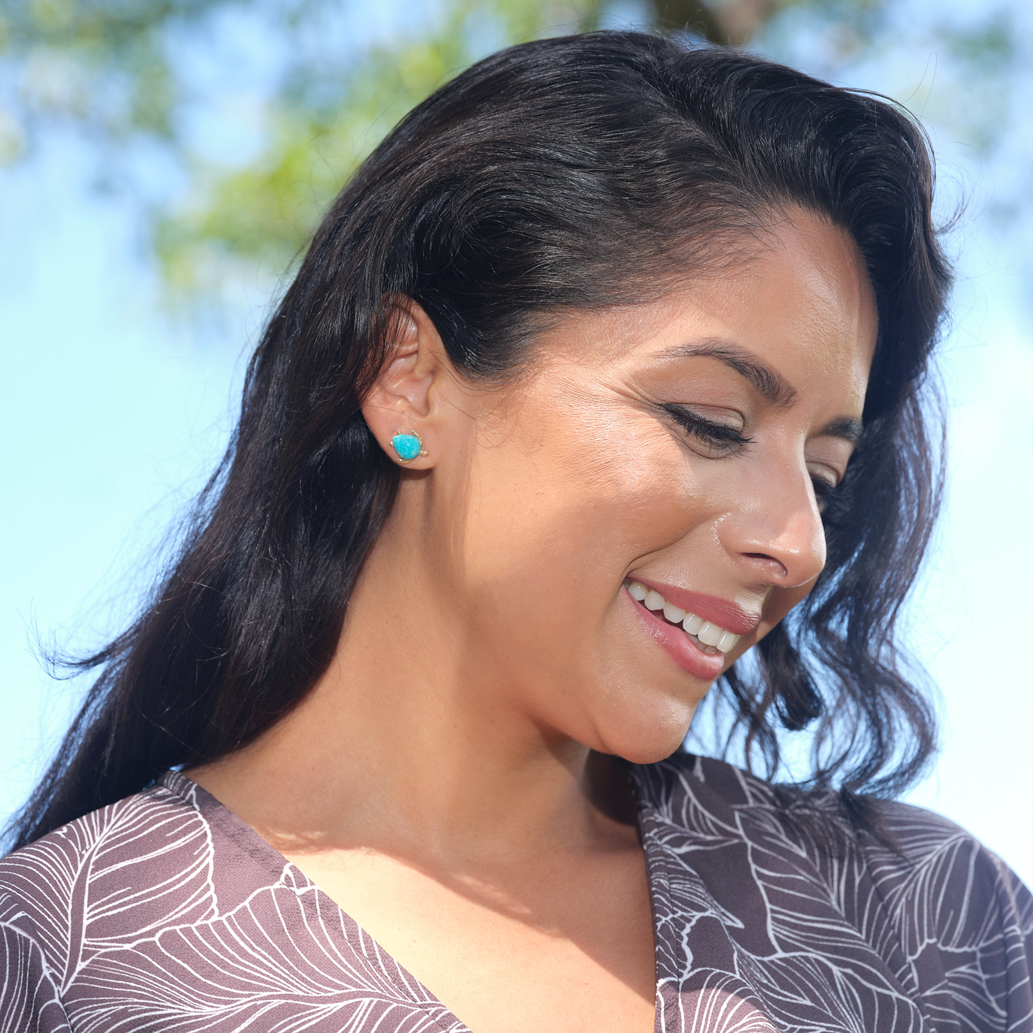 A woman wearing Honu Turquoise Earrings in Gold - 13mm - Maui Divers Jewelry