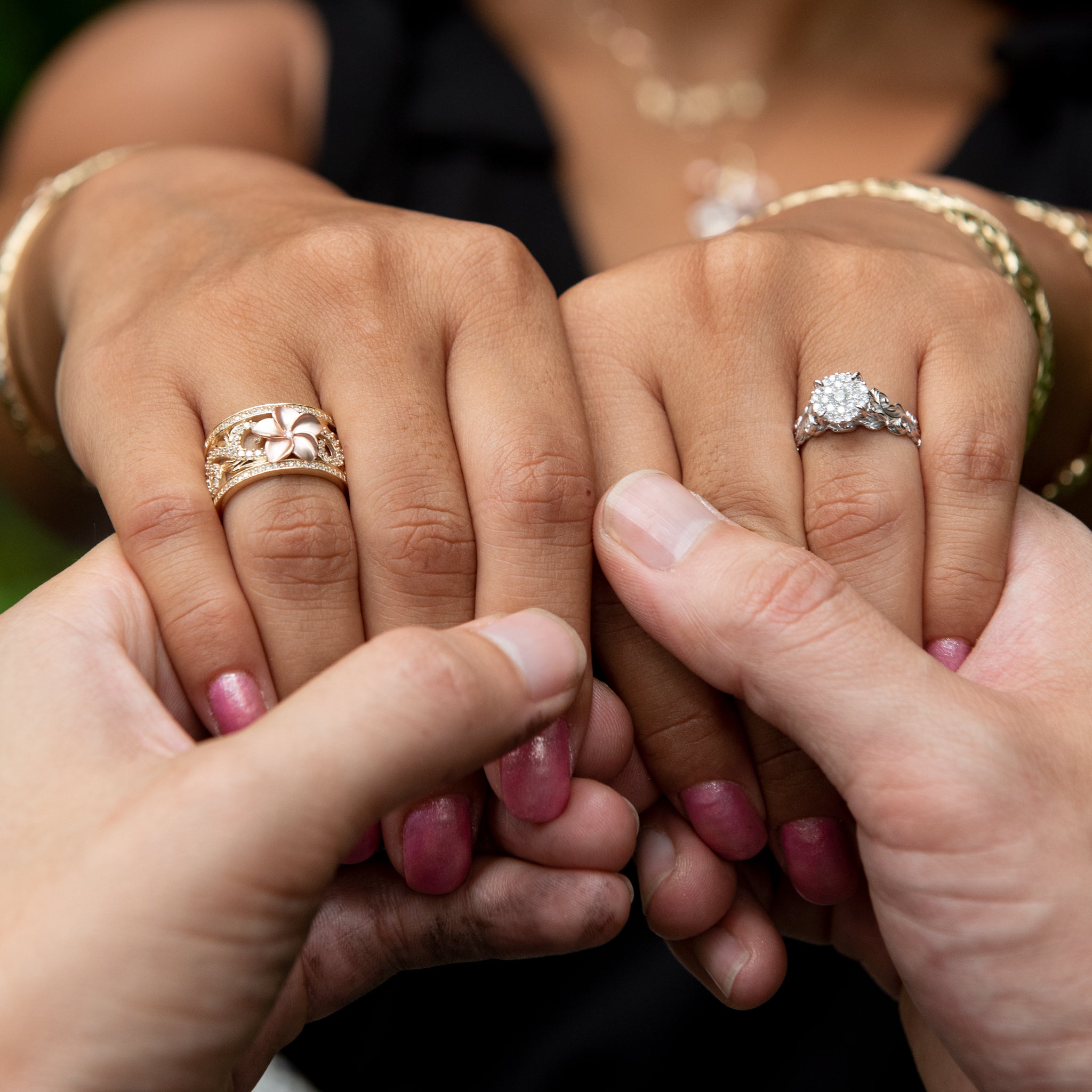 Hawaiian Heirloom Engagement Ring in White Gold with Diamonds on a woman's hands