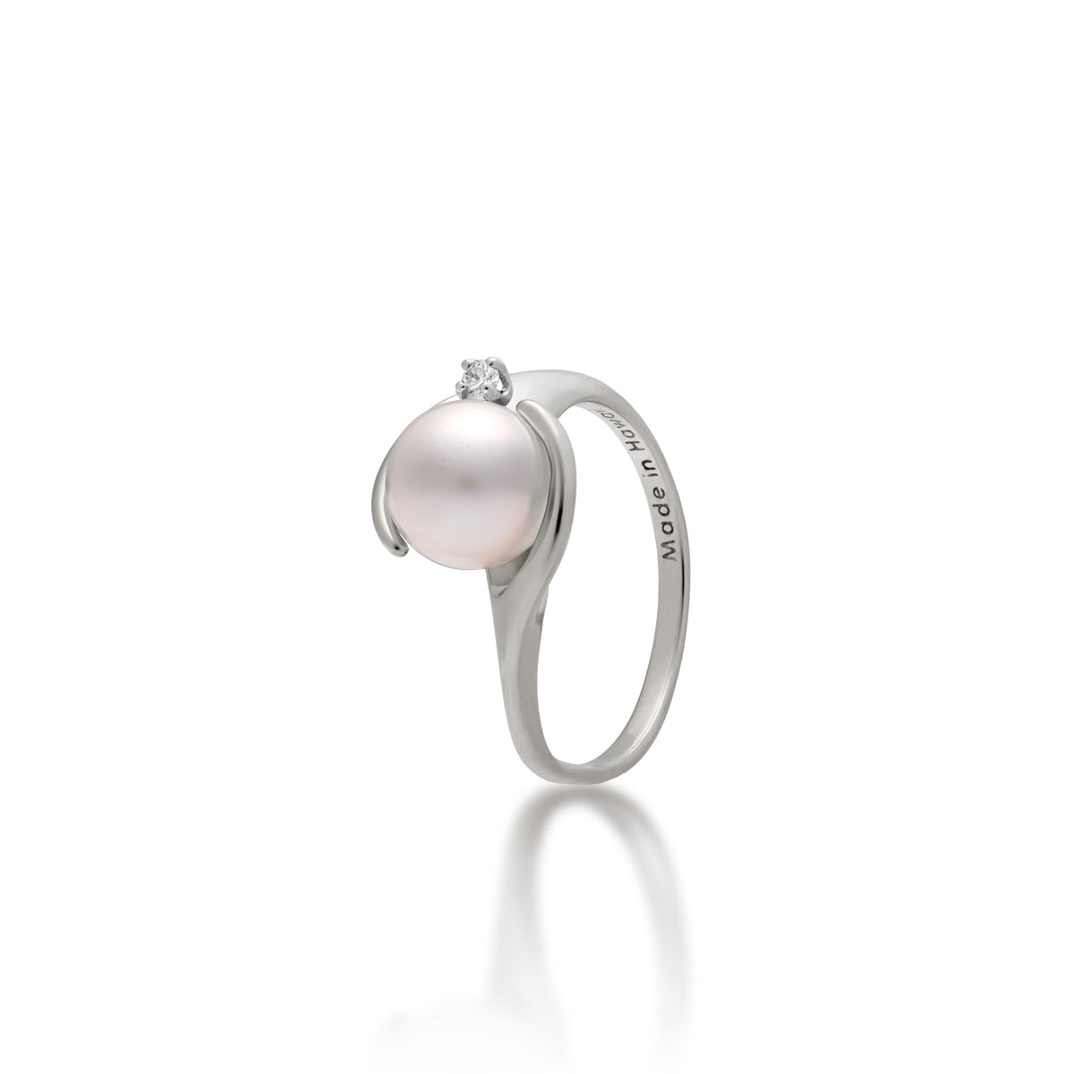  A 14k white gold ring with soft curves at the crown that frame a diamond-accented Akoya white pearl, shown on a white background