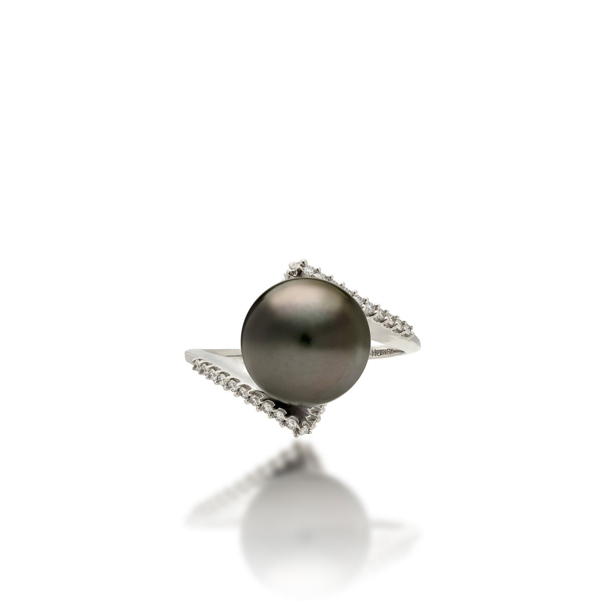 Top view of a 14k white gold diamond bypass ring with a Tahitian black pearl at the top center, shown on a white background