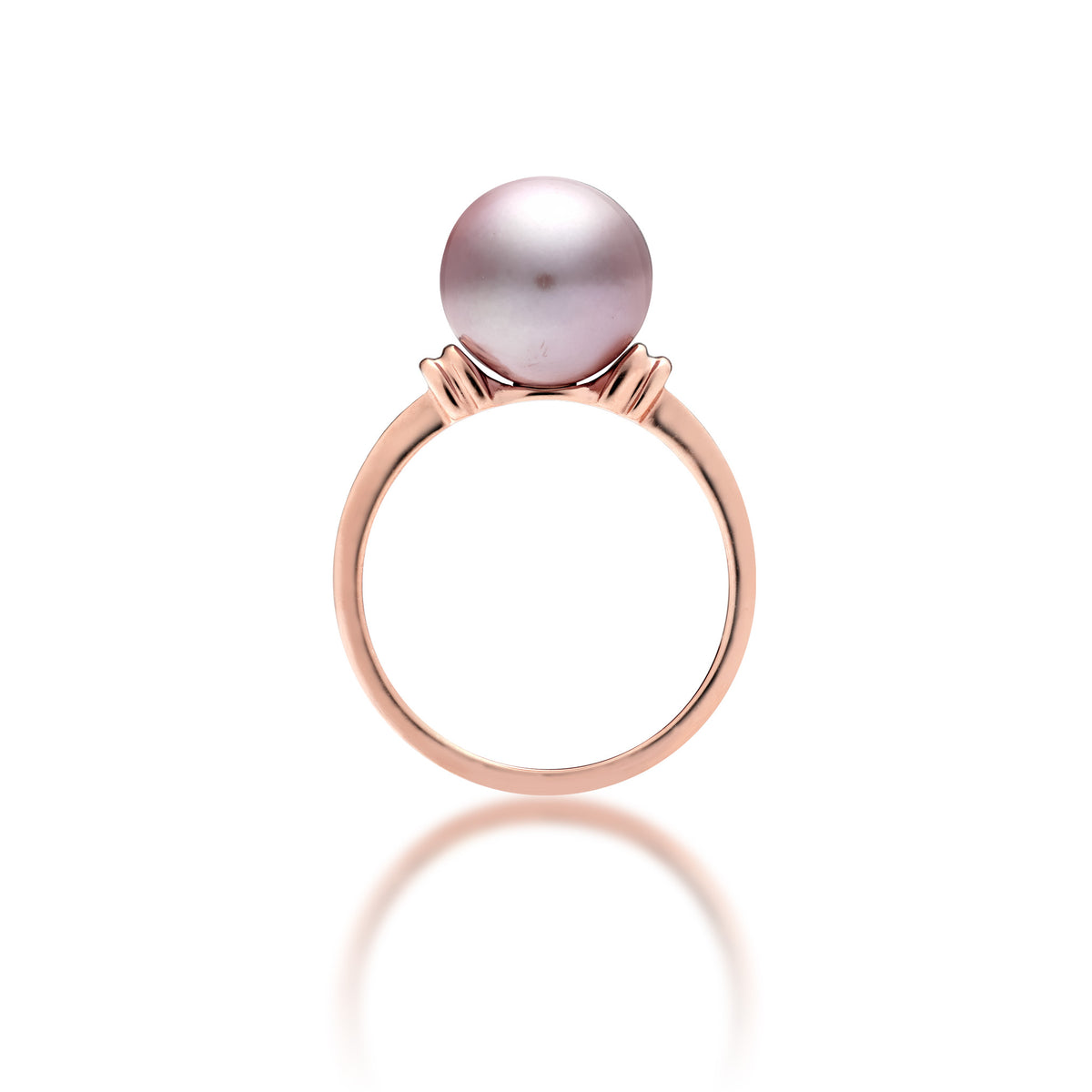 Profile view of a 14k rose gold ring with a lilac freshwater pearl and raised divot accents in rose gold on each side  of the pearl, shown on a white background