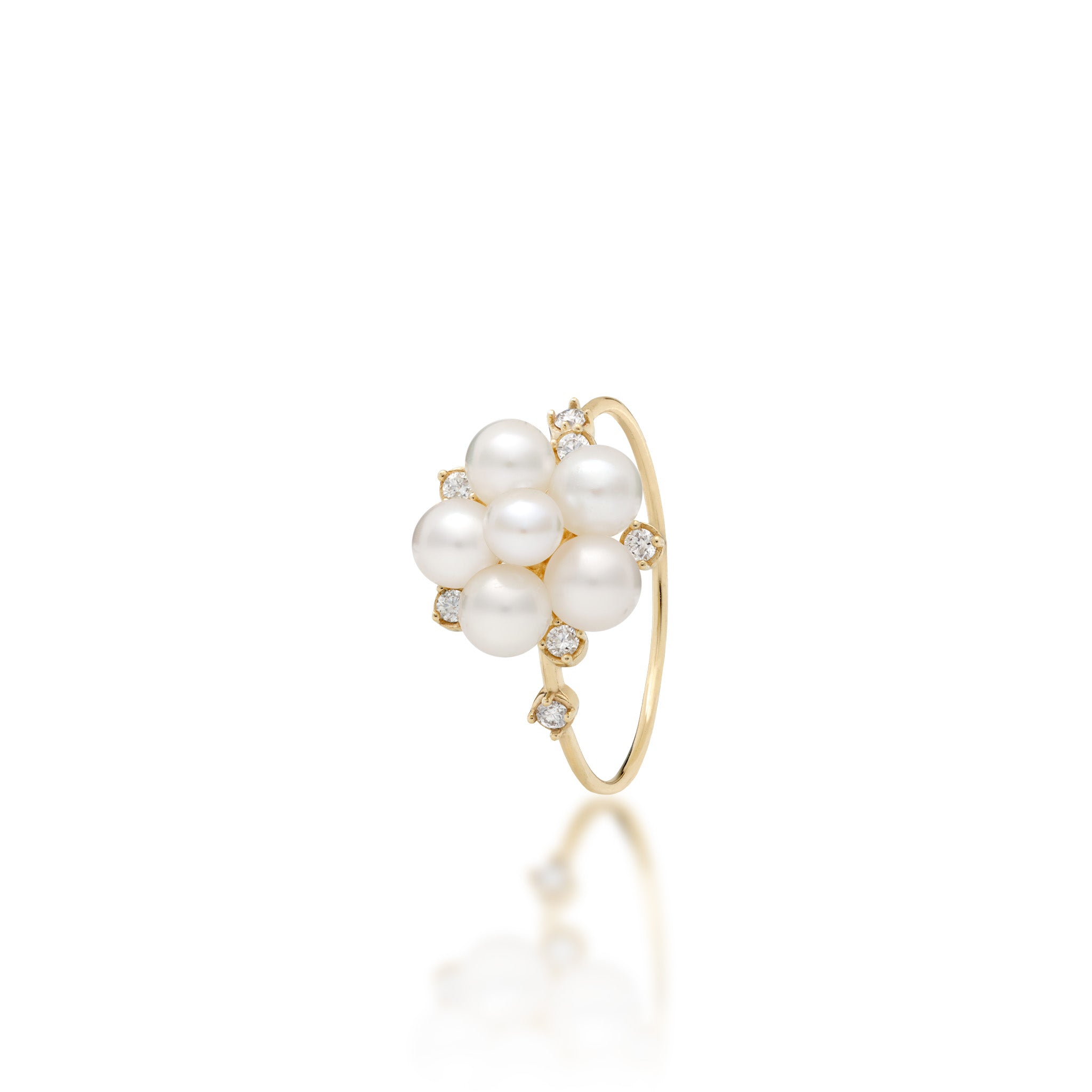 Angle view of a Tiny Bubbles 3-5mm Freshwater White Pearl Ring in 14k Yellow Gold with Diamonds on a white background