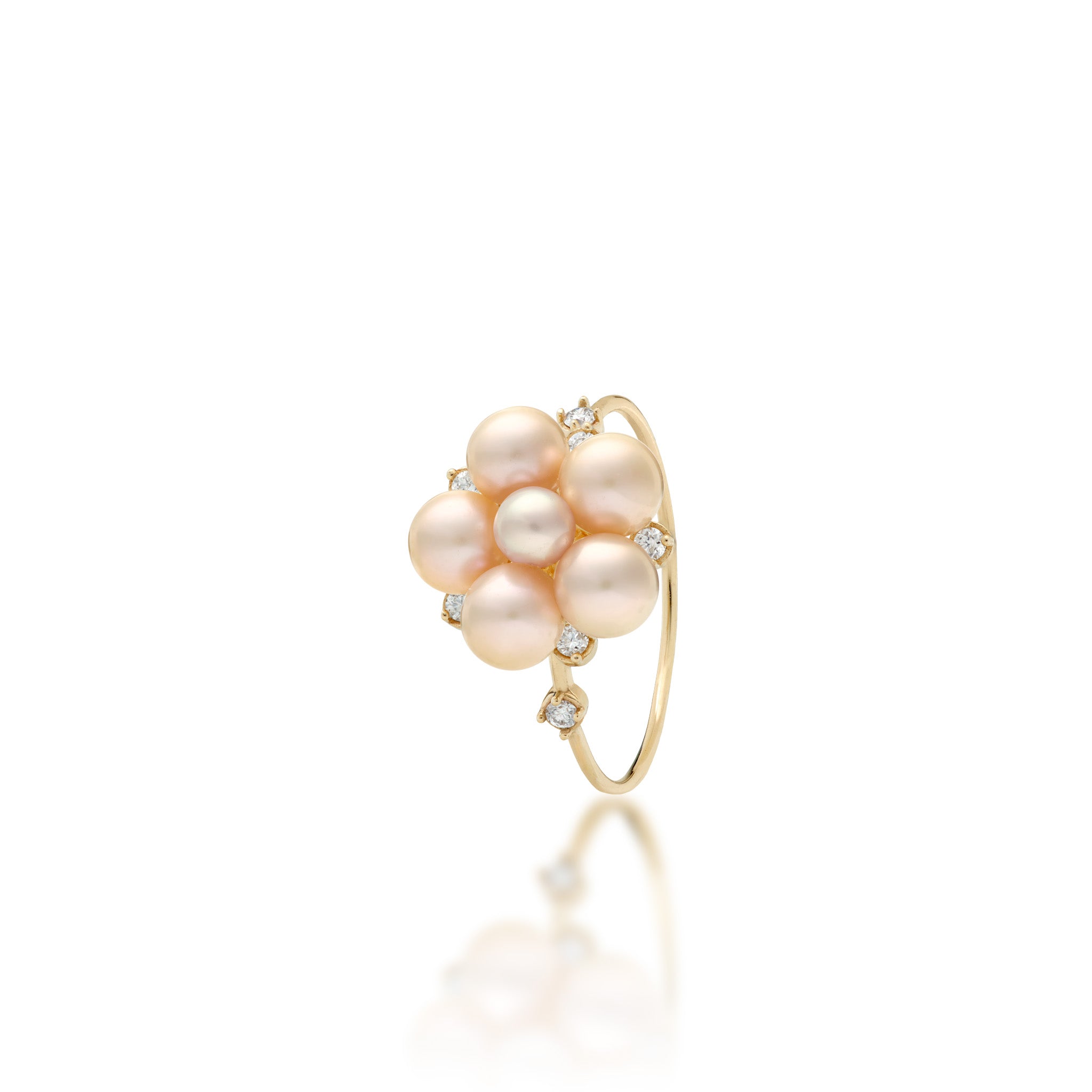 Angle view of a Tiny Bubbles 3-5mm Freshwater Peach Pearl Ring in 14k Yellow Gold with Diamonds on a white background