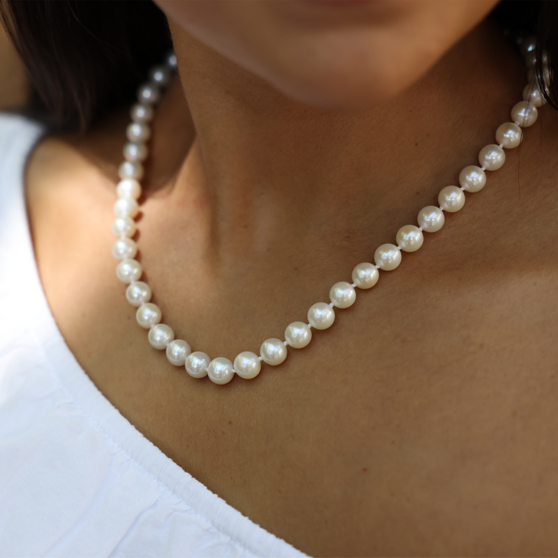 Oval White Freshwater Rice Pearl Double layered Necklace with Pearl Ta –  TARUNA BIYANI®