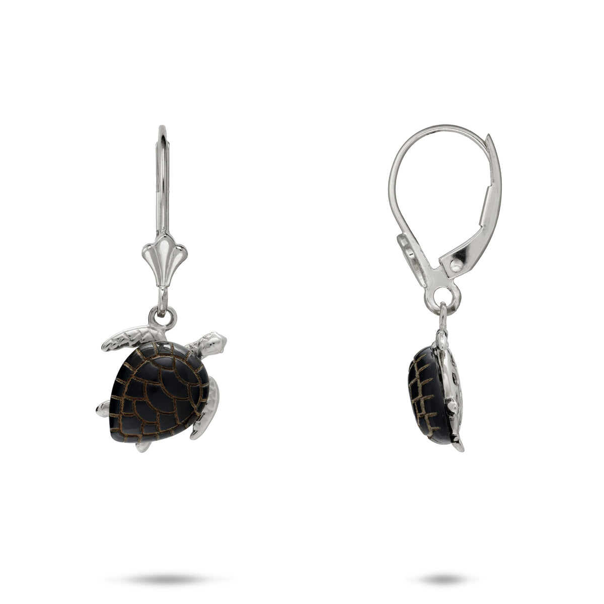A pair of 14k white gold leverback earrings, one showing the front view and the other showing the side view, dangling from the leverback is a Hawaiian green sea turtle with etched Hawaiian black coral as the shell and life-like high-polish gold detailing for the head and legs, shown on a white background