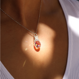 A woman wearing a Pineapple Crystal Pendant in Sterling Silver - Maui Divers Jewelry
