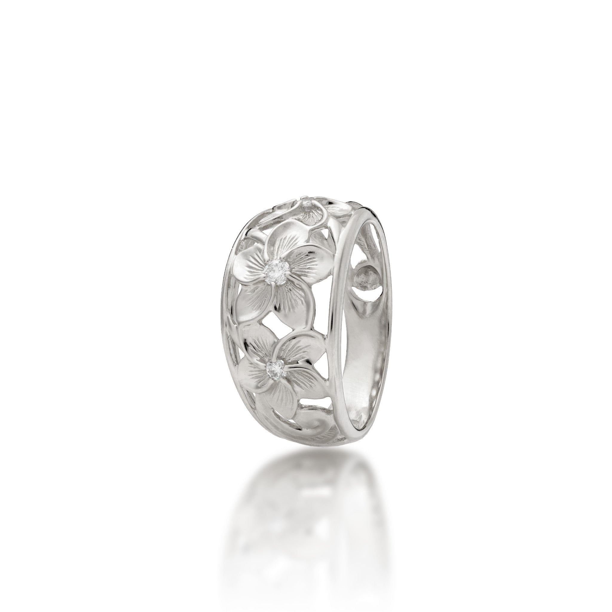 Angle view of the 11mm Hawaiian Heirloom Plumeria Ring in White Gold with Diamonds on a white background