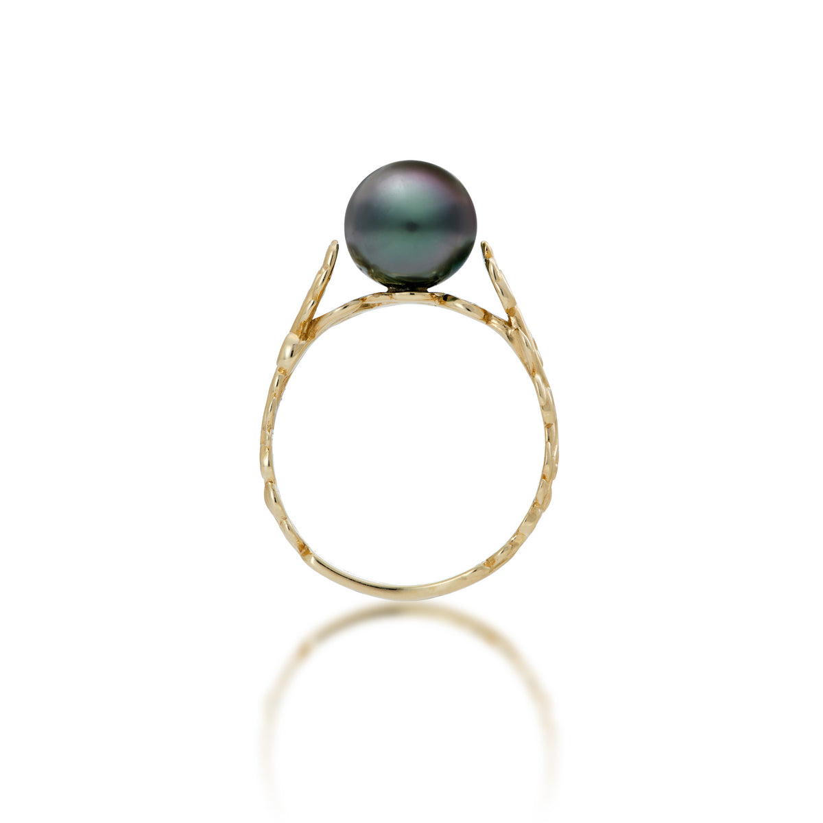 Side view of a 14k Yellow Gold Living Heirloom Ring with a Tahitian black pearl at the crown, shown on a white background