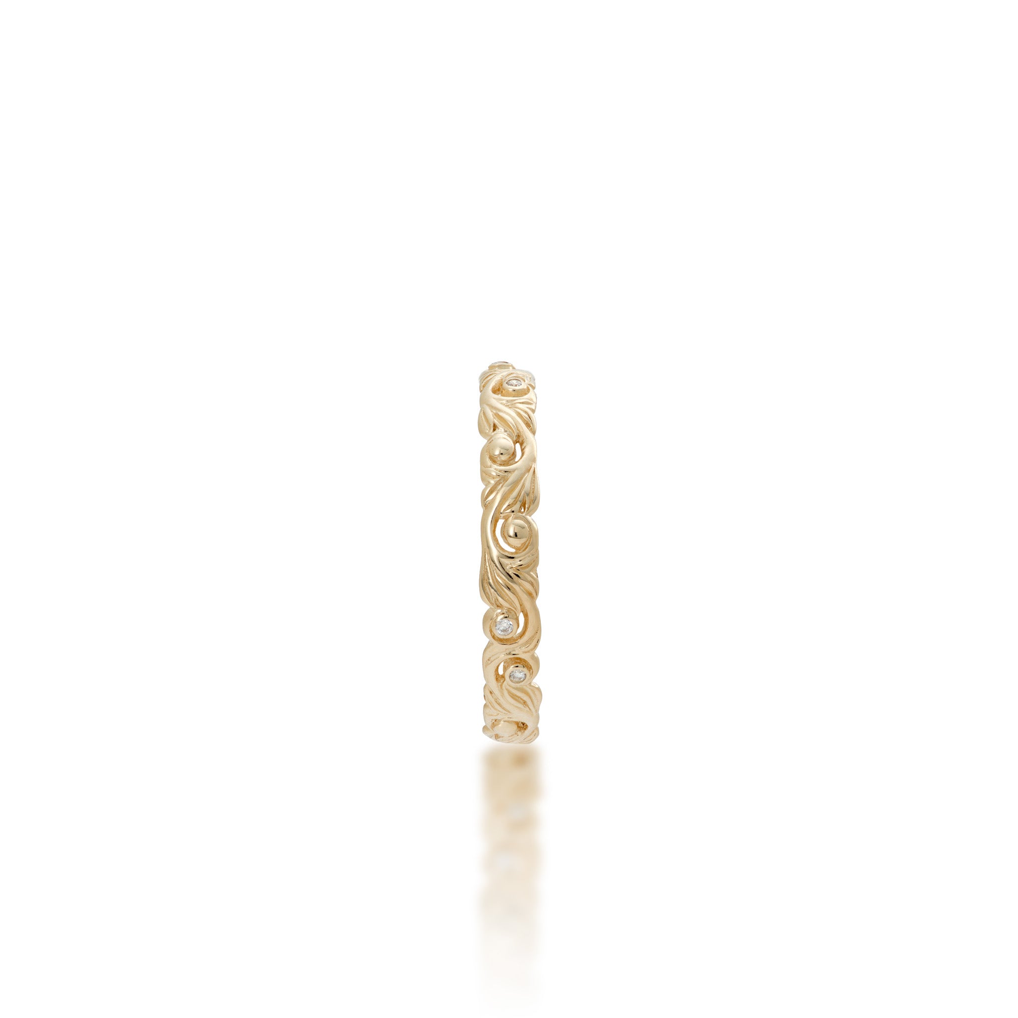 Top view of the 3mm Living Heirloom Ring in Gold with Diamonds on a white background