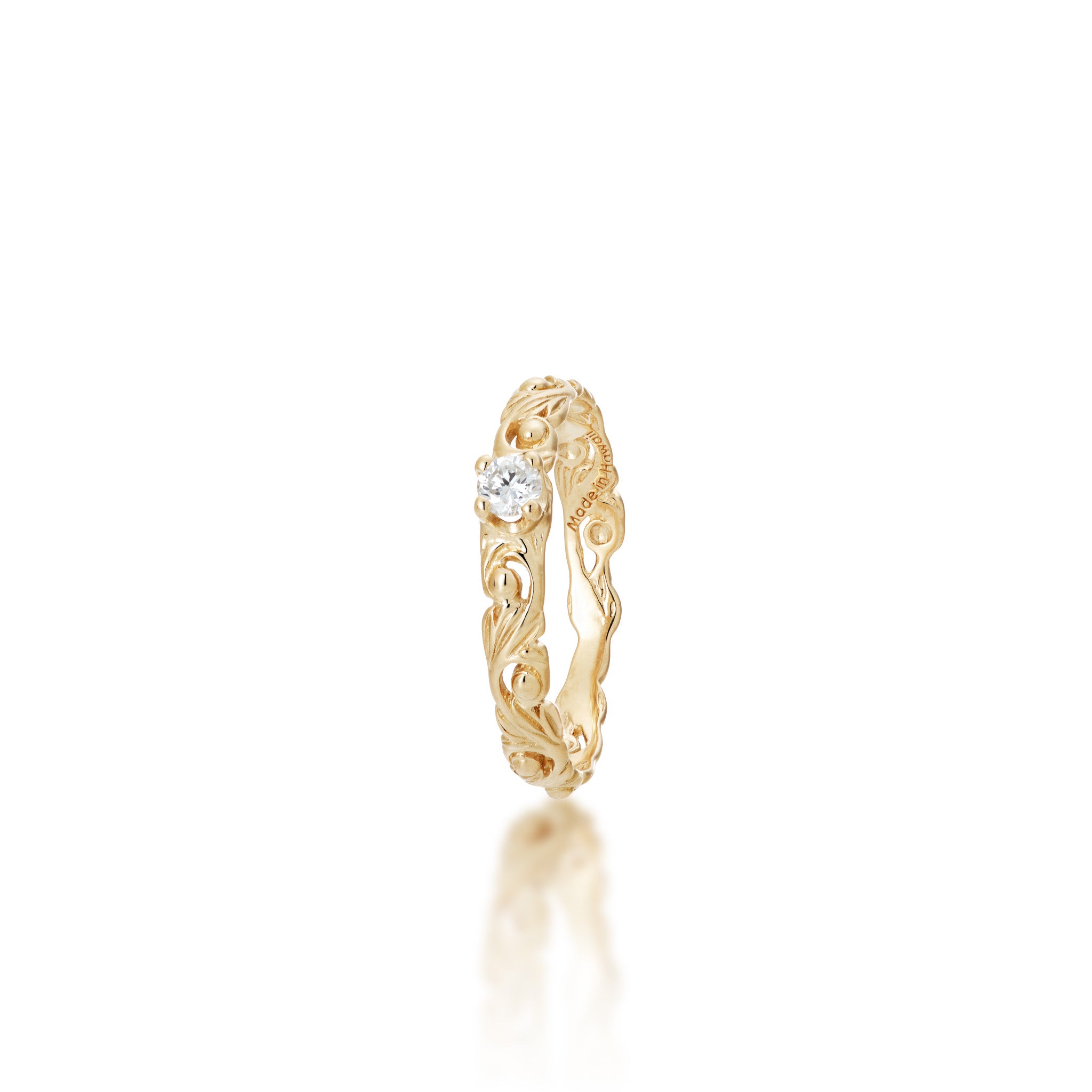 Angled view of the 3mm Living Heirloom Ring in Gold with Diamond on a white background