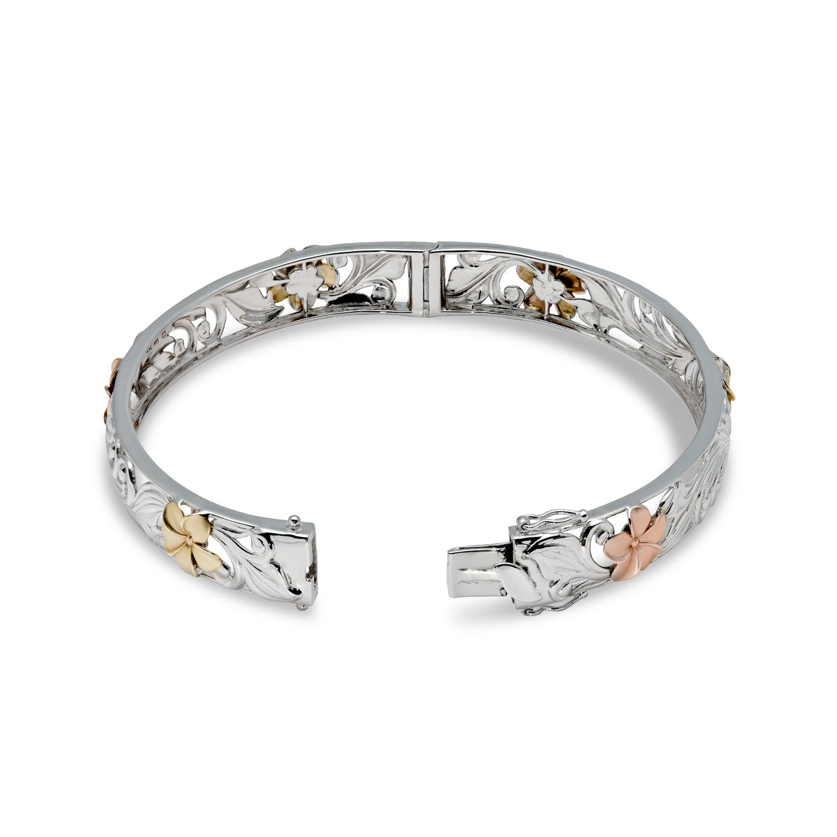 Detailed open hinge shot of a 10mm Hawaiian Heirloom Bracelet in 14k white Gold with cut out design of rose and yellow gold plumeria flowers with diamond accented centers, maile leaves and hapuʻu fern; placed on a white background