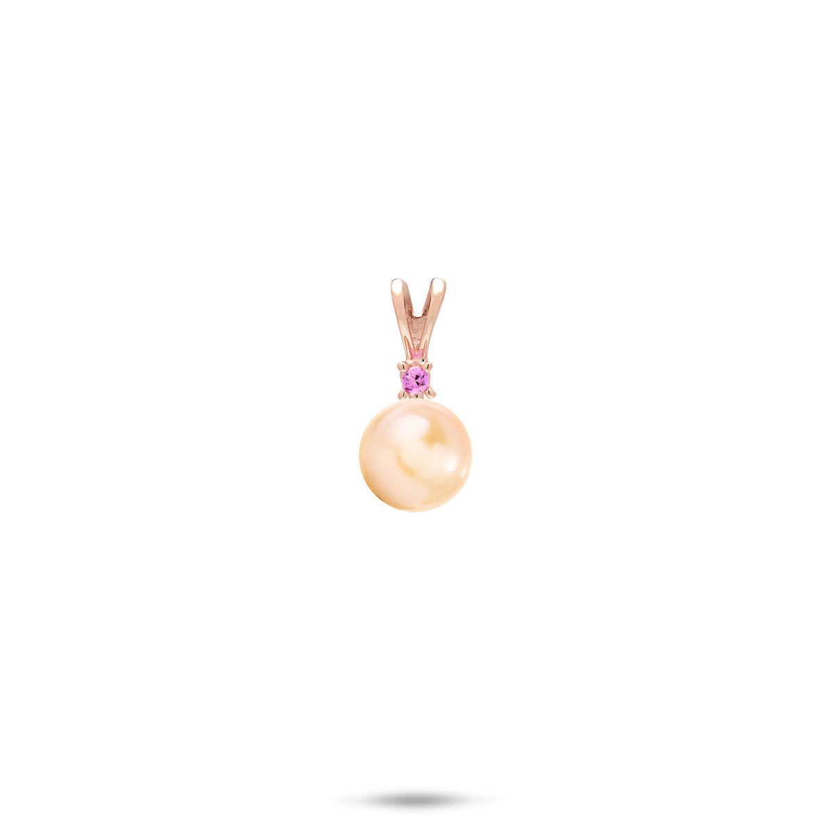 A simple 14k rose gold pendant with a V shape bail, a pink sapphire, and peach freshwater pearl, shown on a white background