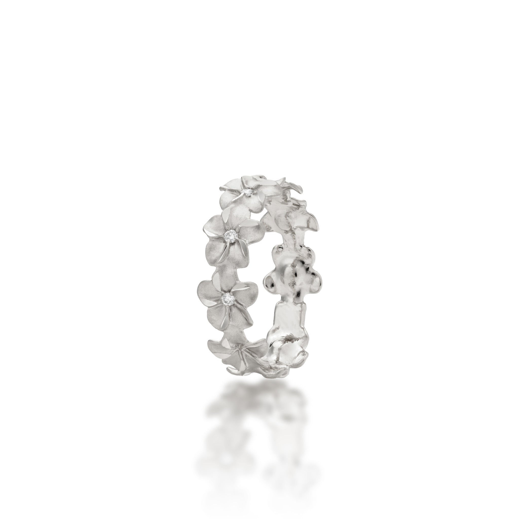 Angle view of the 6mm Plumeria Eternity Ring in 14k White Gold with Diamonds