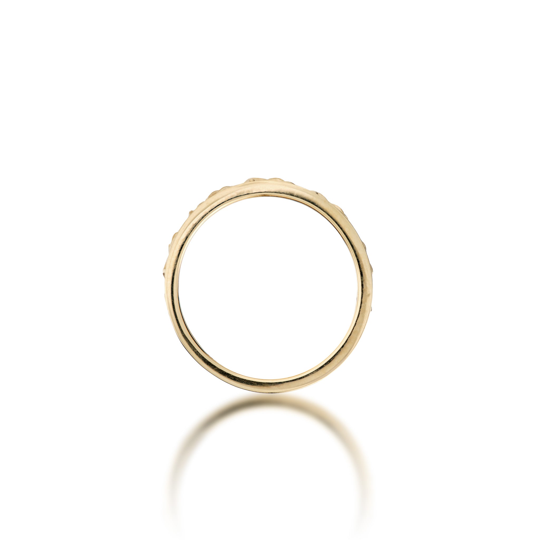 Side view of the 10mm Plumeria Ring in Gold with Diamonds on a white background