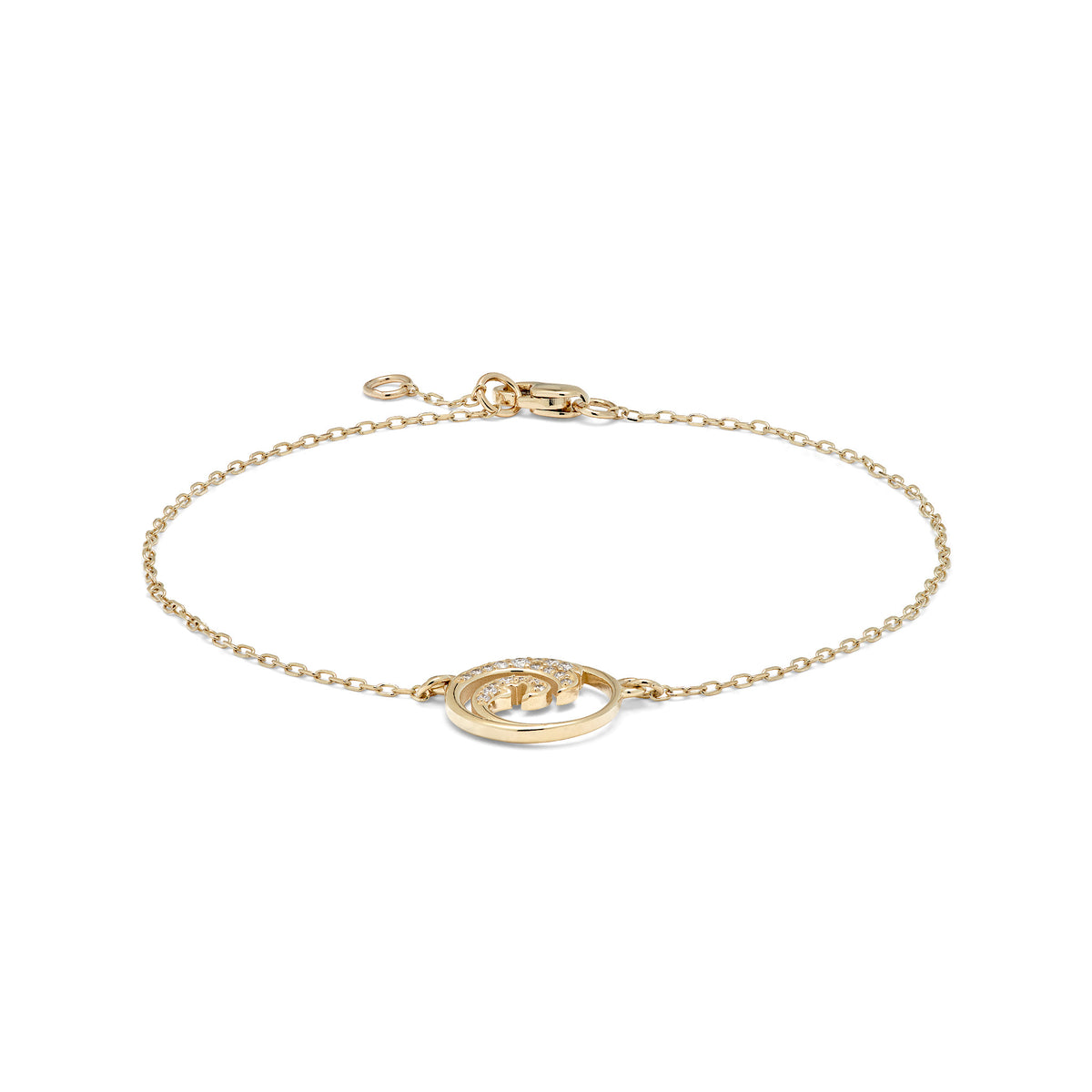 A 14k yellow gold chain bracelet with a 12mm diamond accented ocean wave circle charm, adjustable chain, and lobster claw clasp, shown on a white background