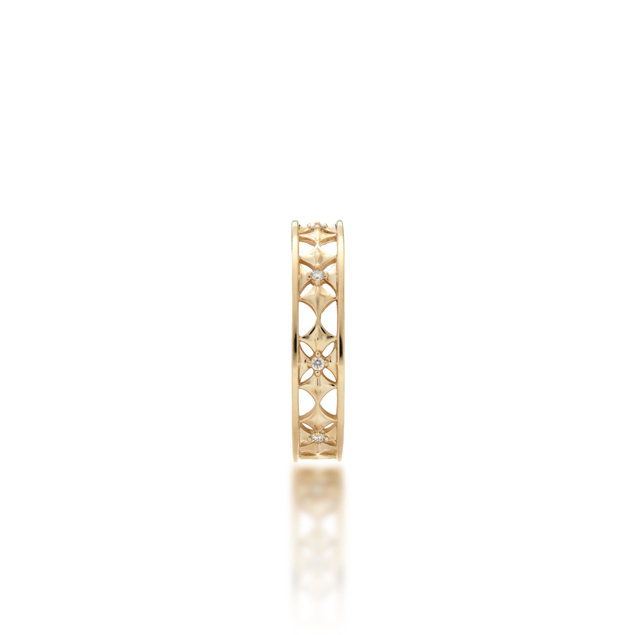 Top view of the Angle view of the 4.5mm Hawaiian Quilted Star Ring in 14k Yellow Gold with Diamonds on a White Background