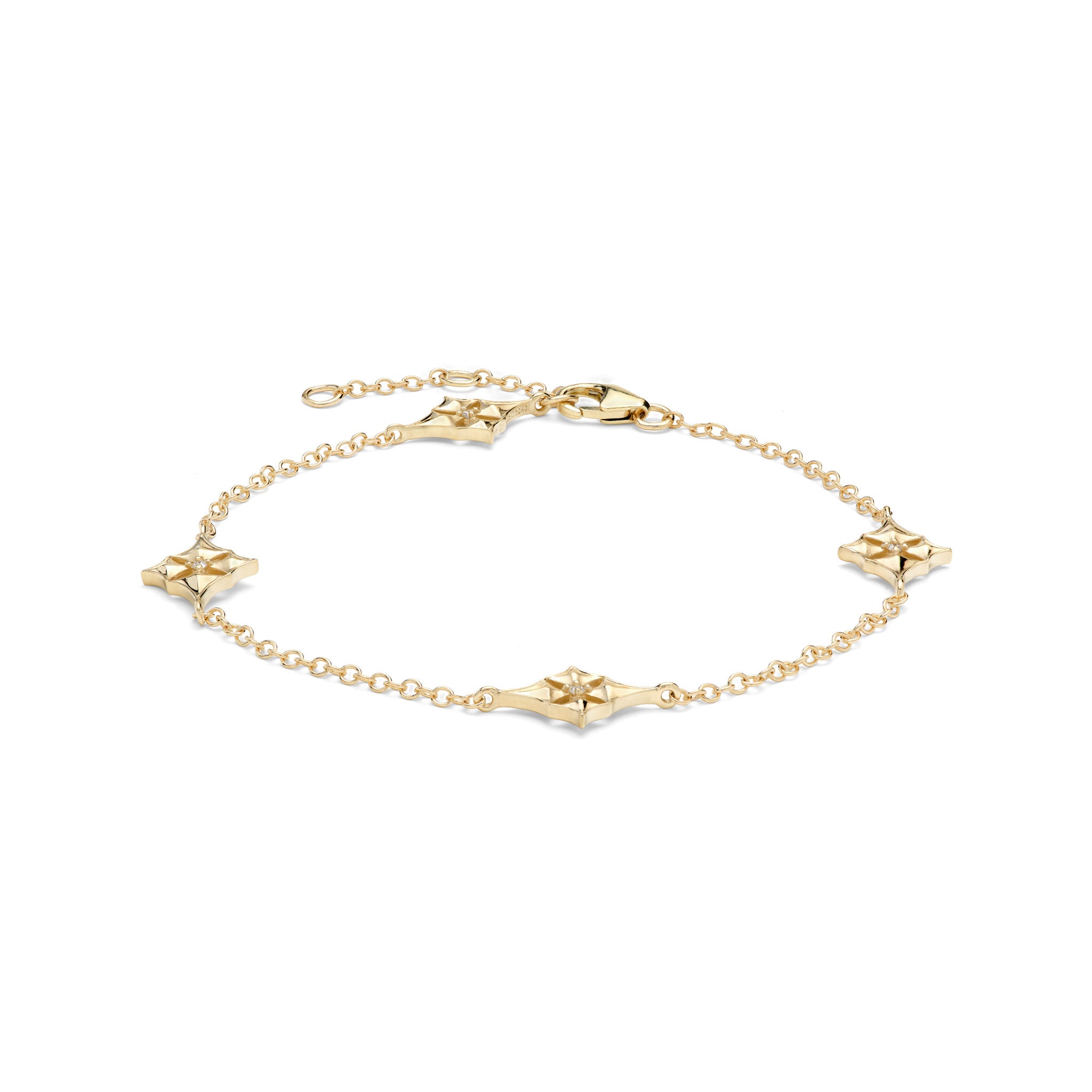 Angle view of the 7-8" Adjustable Hawaiian Quilted Star Bracelet in 14k Yellow Gold with Diamonds