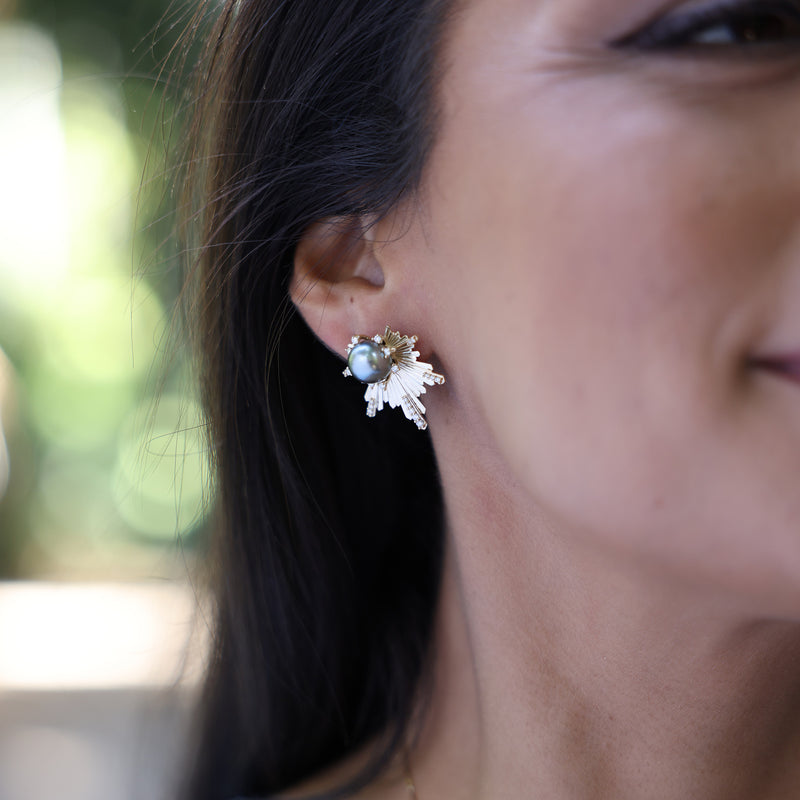 Model wearing E Hoʻāla Tahitian Black Pearl Earrings in Gold with Diamonds - 23mm