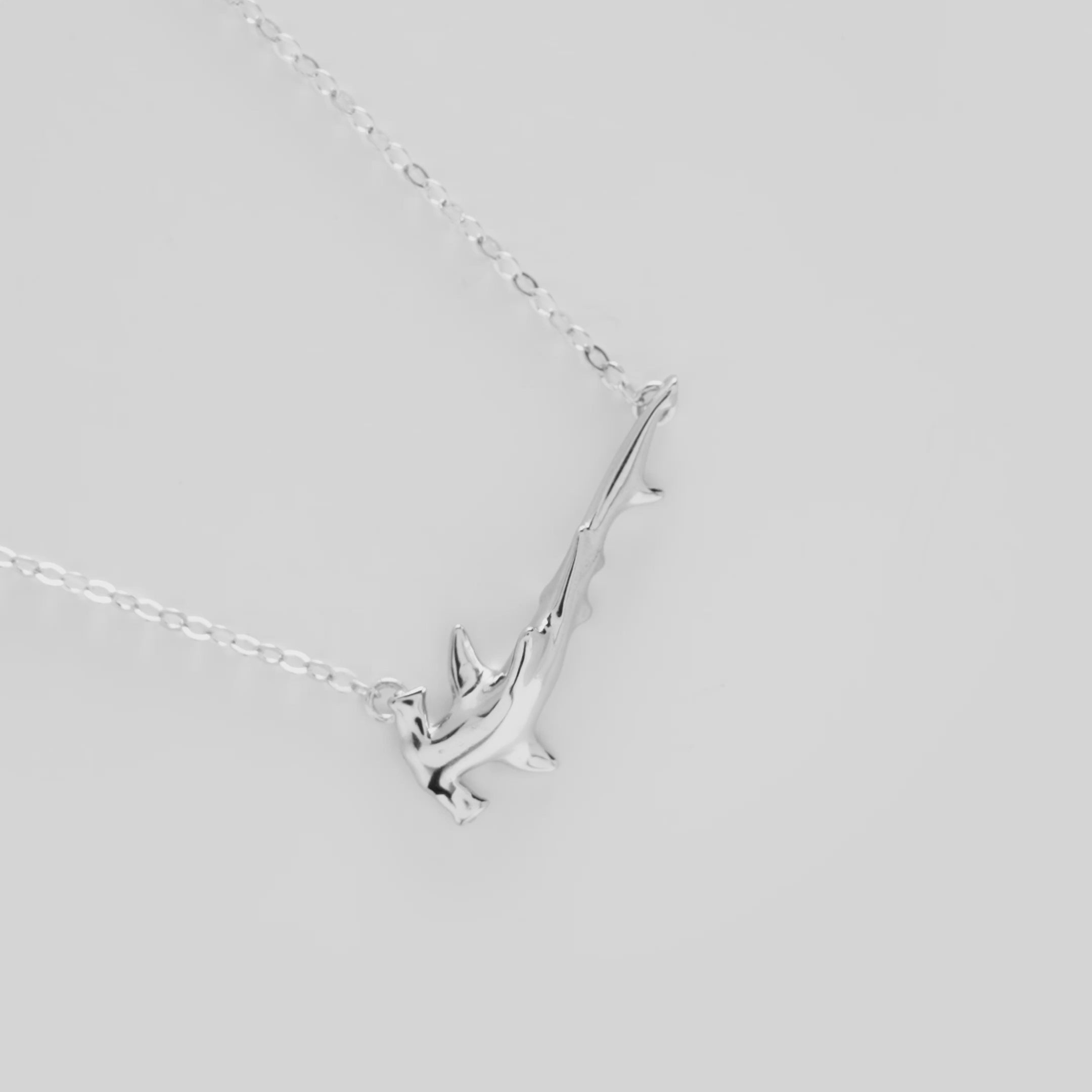 Video showcasing the 16-18" Adjustable Hammerhead Shark Necklace in Sterling Silver on a turn table
