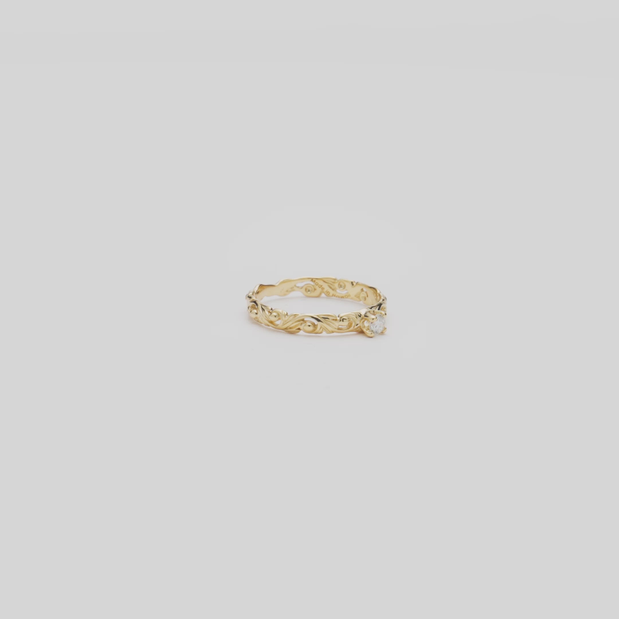 Video of the 3mm Living Heirloom Ring in Gold with Diamond turning on a white background
