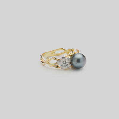 Video of the Pearls in Bloom Plumeria Tahitian Black Pearl Ring in Tri Color Gold with Diamonds turning on a white background