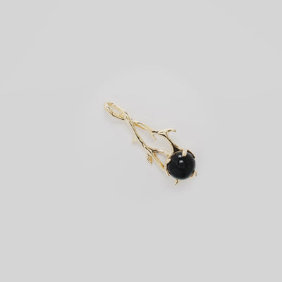 Video showcasing the 39mm Heritage Black Coral Pendant in 14k Yellow Gold on a turn table