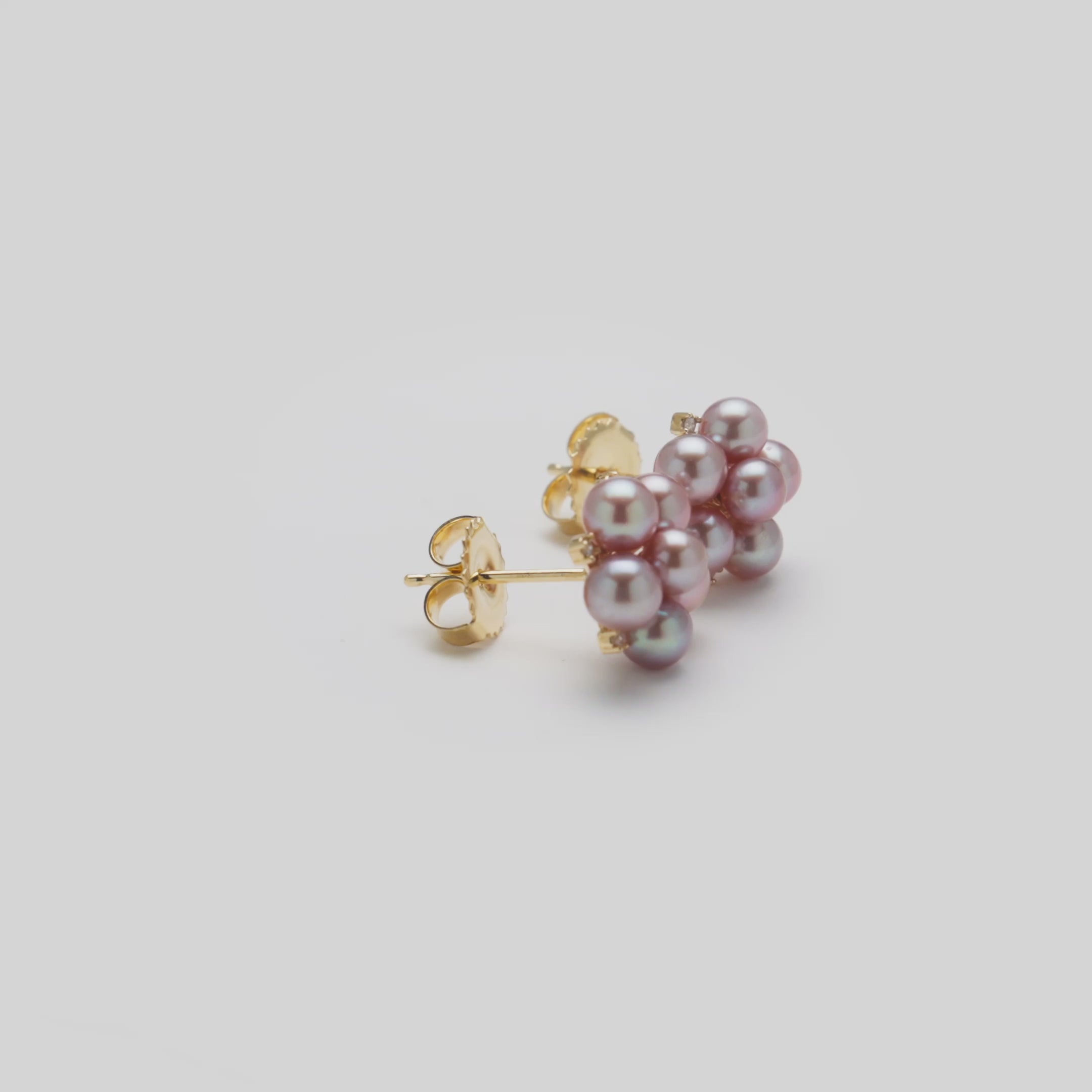 Video showcasing the Tiny Bubbles Lavender Freshwater Pearl Stud Earrings in 14k Yellow Gold with Diamonds
