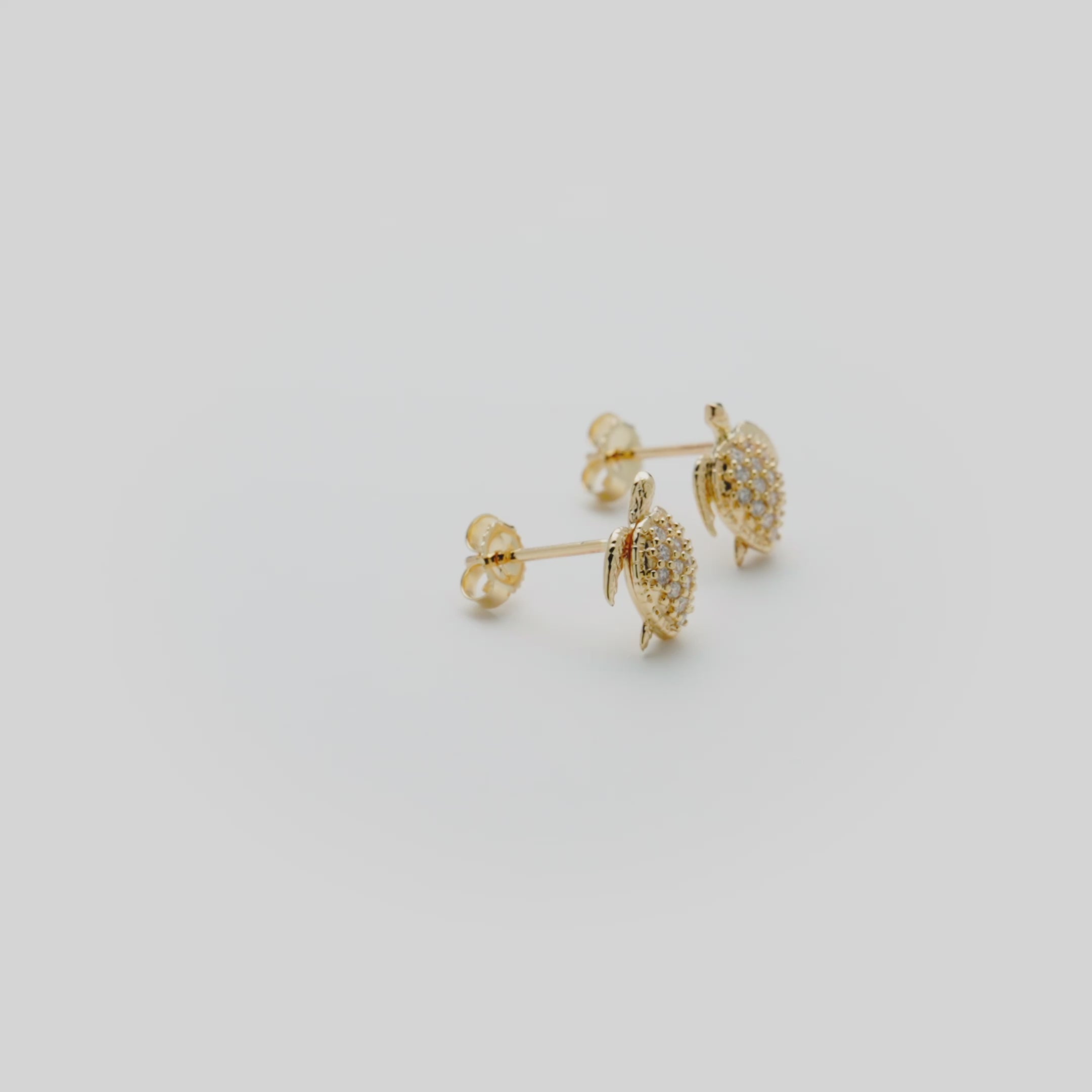 Video showcasing the Video showcasing the 10mm Honu Diamond Earrings in 14k Yellow Gold