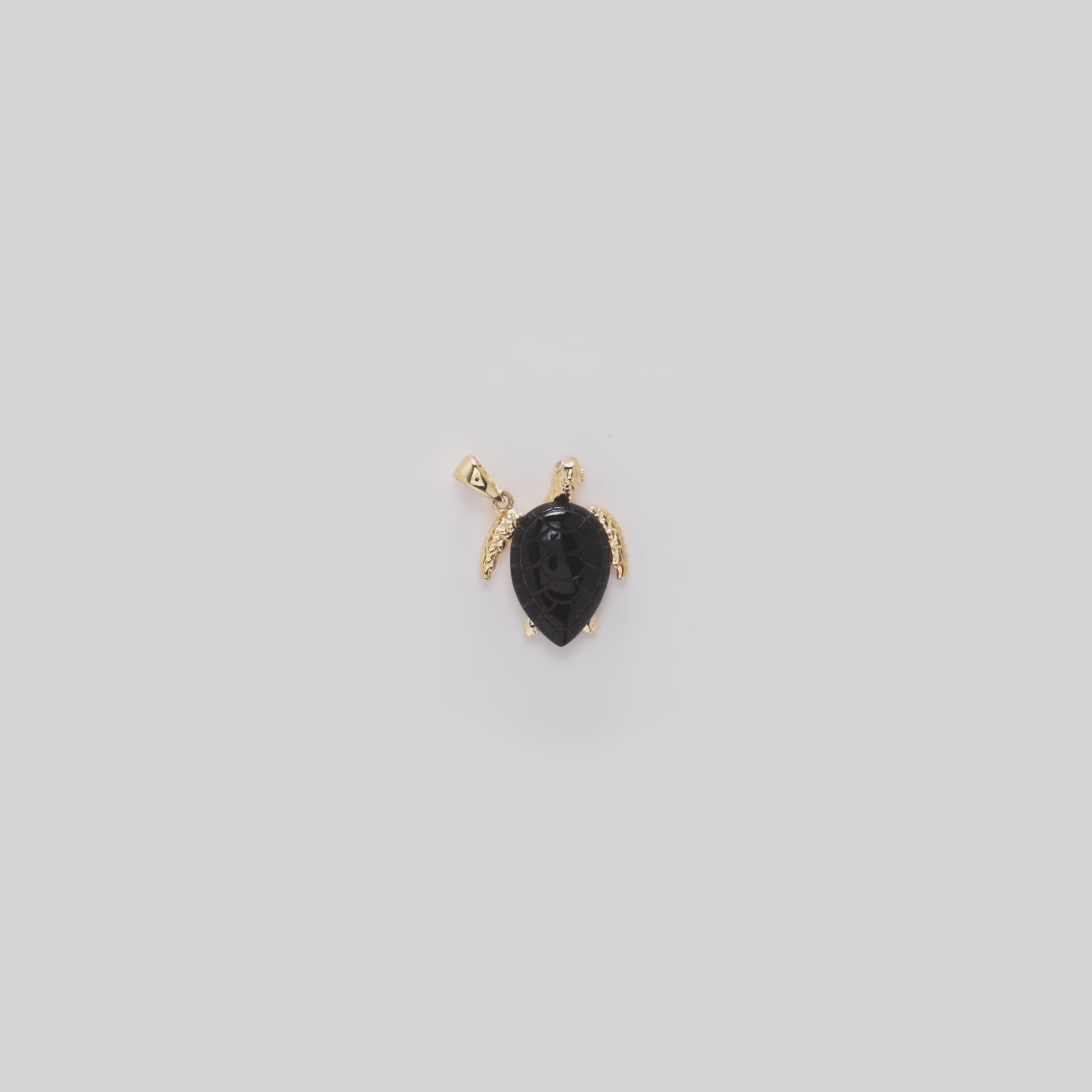 Video showcasing the 15mm Honu Black Coral Pendant in Gold with Diamonds