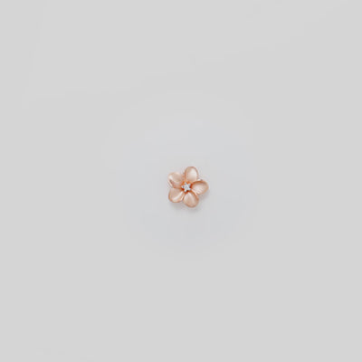 Video showcasing the 16mm Plumeria Pendant in 14k Rose Gold with Diamond on a turn table