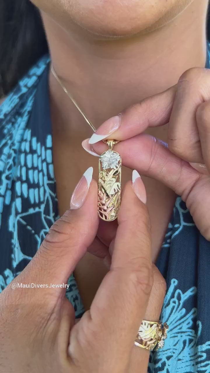 Video of a woman wearing a Hawaiian Gardens Hibiscus Pendant in Multi Color Gold with Diamonds - 32mm - Maui Divers Jewelry