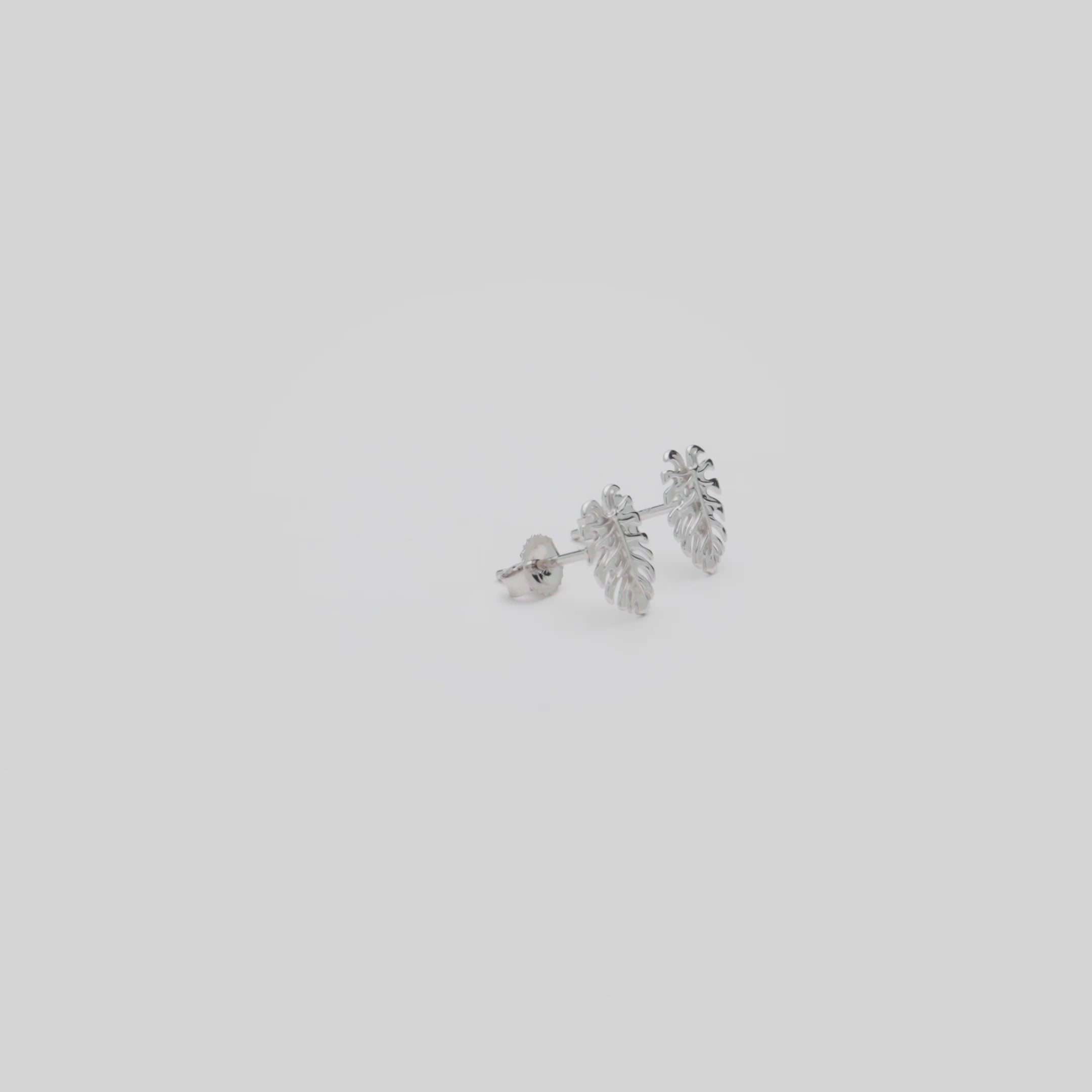 Video showcasing the 9mm Monstera Earrings in 14k White Gold