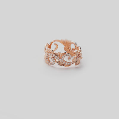 Video showcasing the 8mm Hawaiian Heirloom Plumeria Ring in 14k Rose Gold with Diamonds