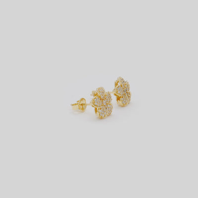 Video showcasing the 11mm Plumeria Earrings in Gold with Diamonds on turn table