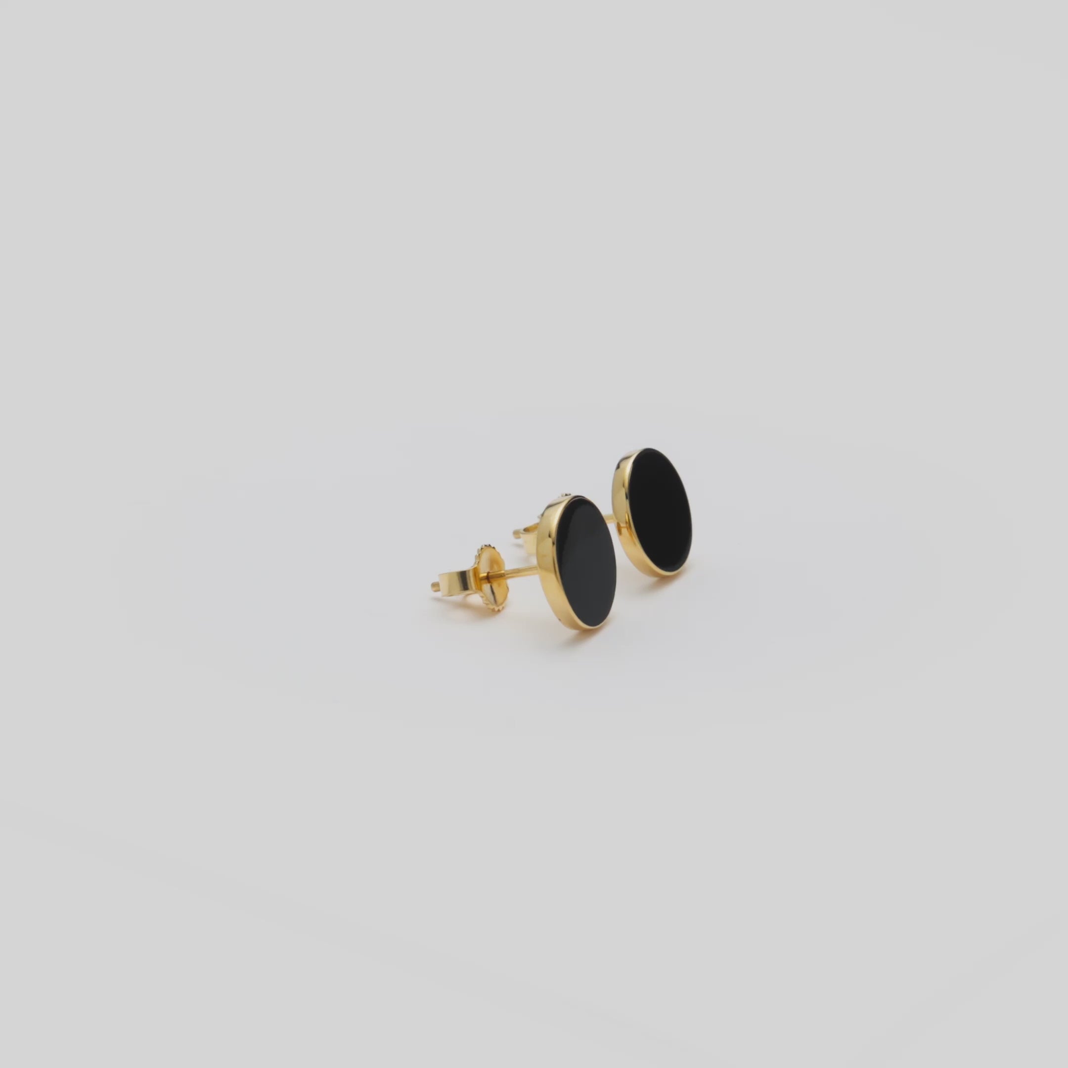 Video showcasing the Eclipse Hawaiian Black Coral Earrings in 14k Yellow Gold
